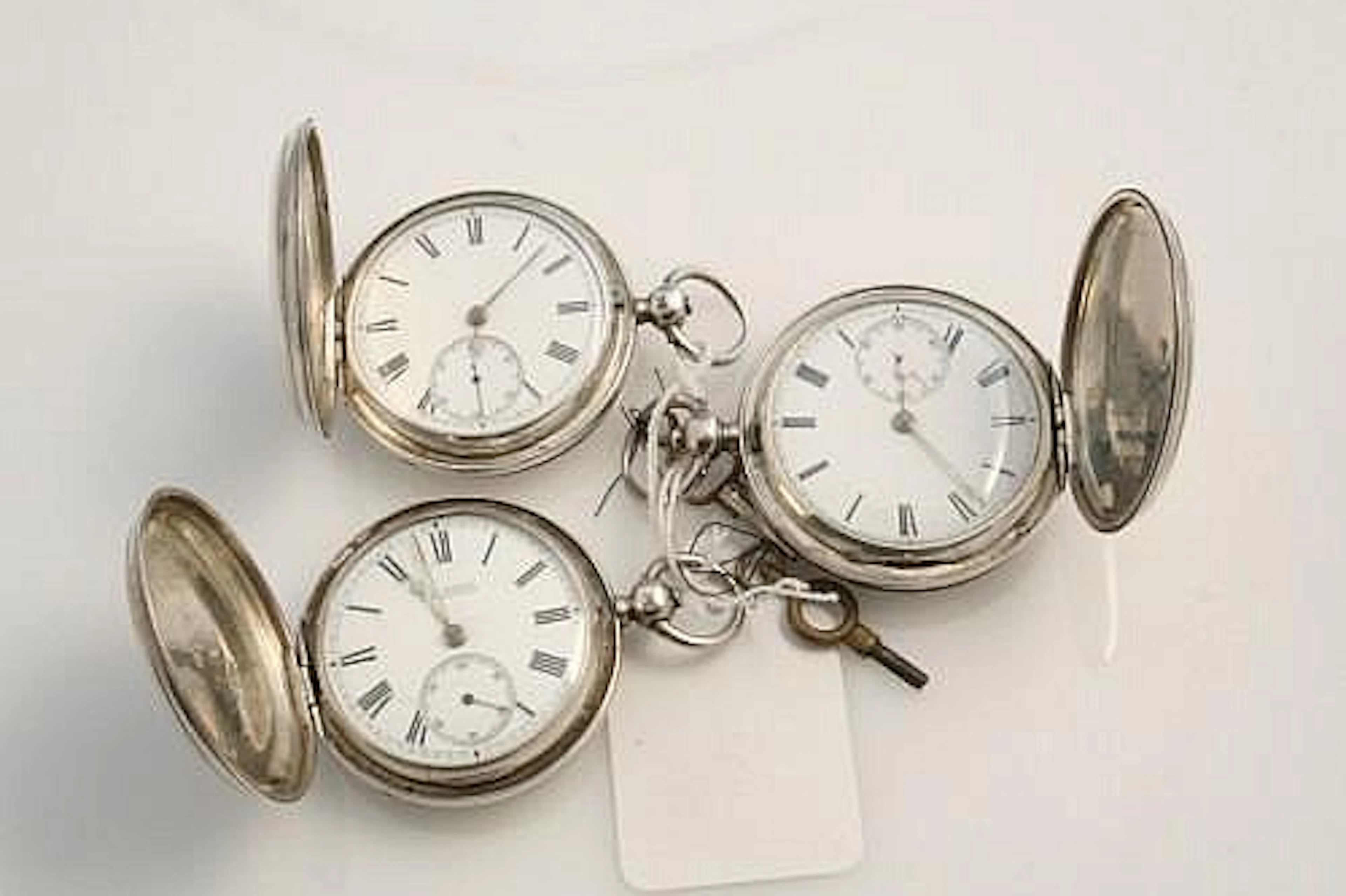 Three late Victorian silver keywind hunter pocket watches