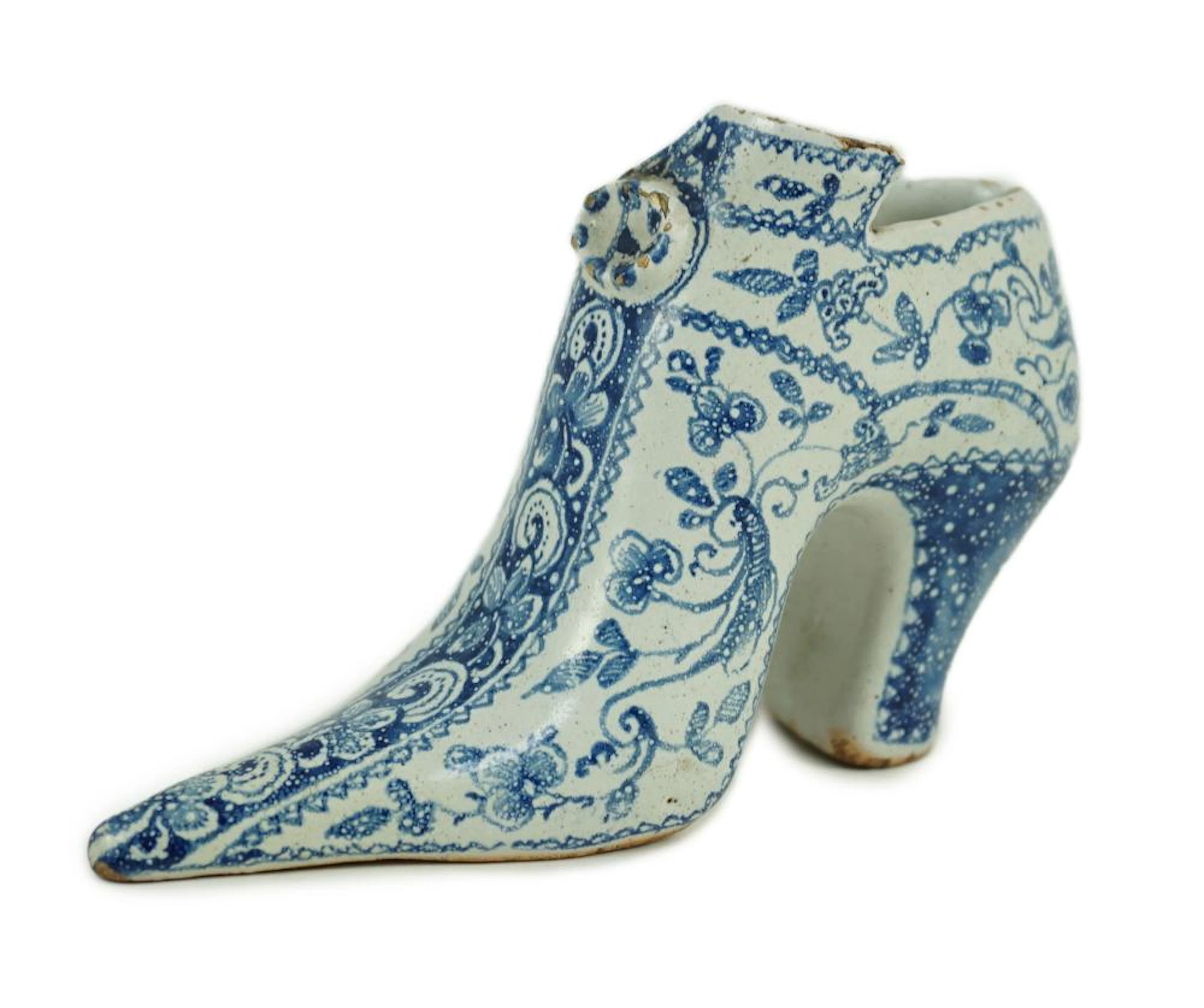 A documentary English delftware blue and white model of a shoe
