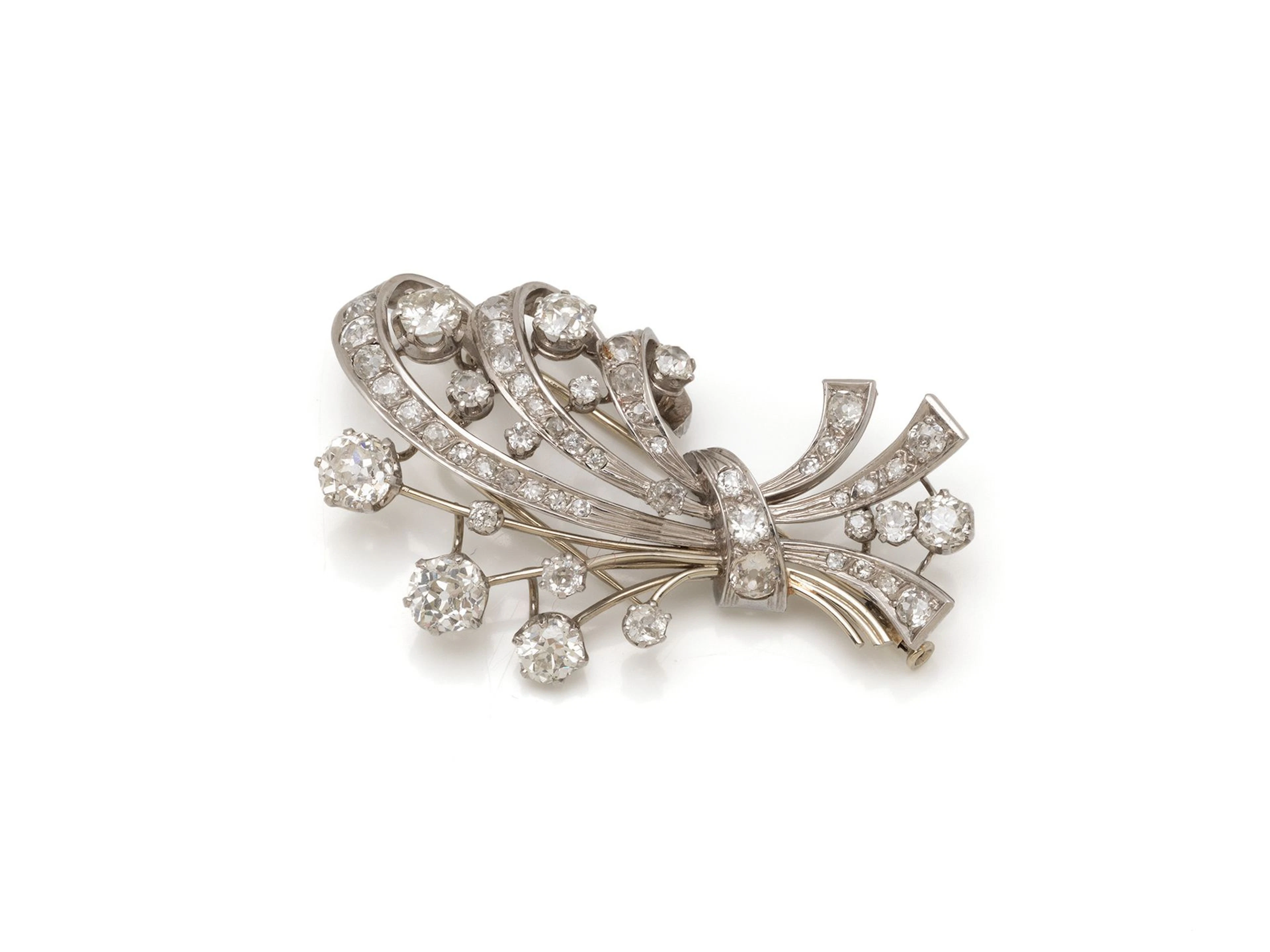 Clip de revers en or gris 750 millièmes stylisant..