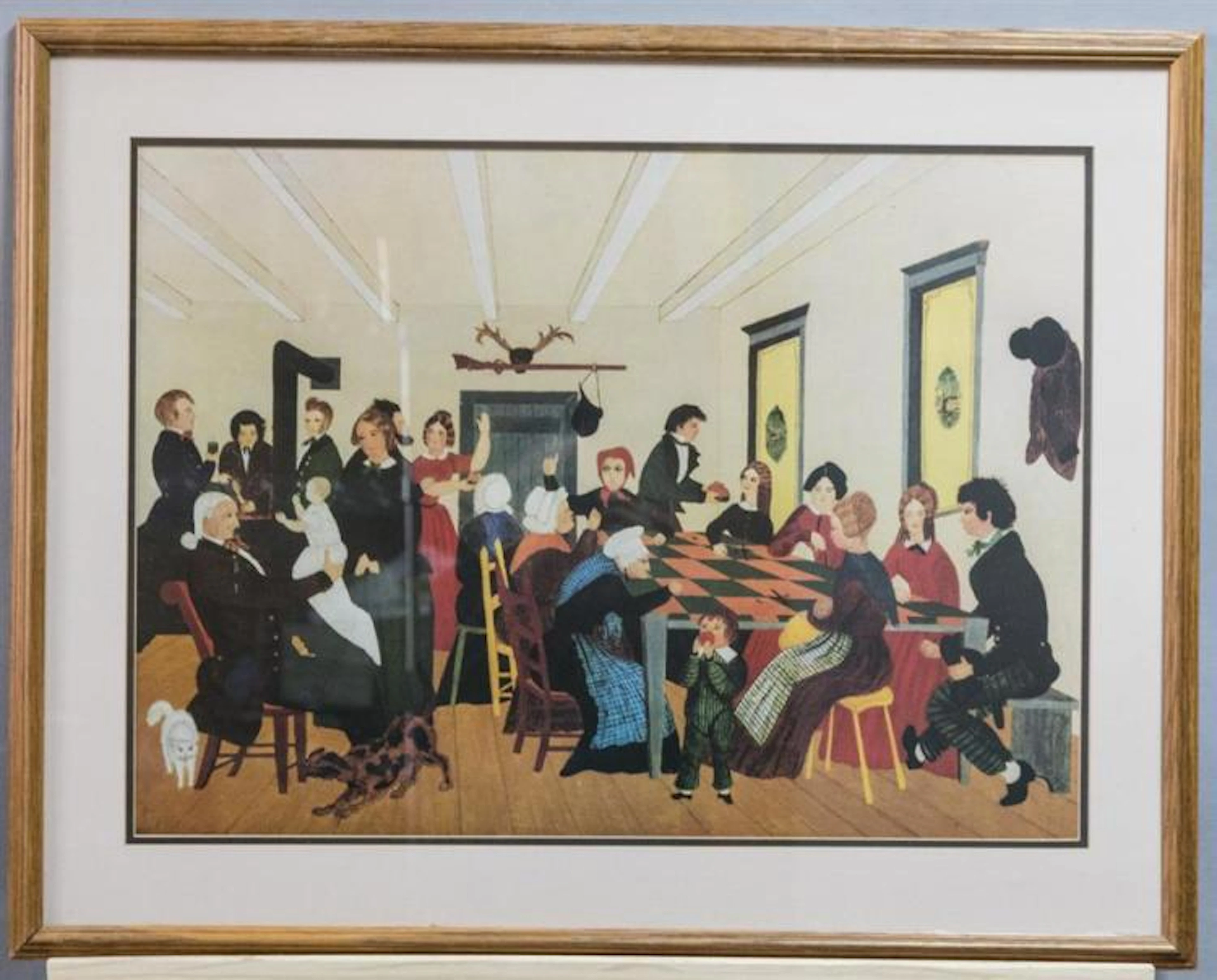 Three pieces of art including a framed Japanese Art poster from the Seattle Art Museum, a framed print depicting a dinner party, and...