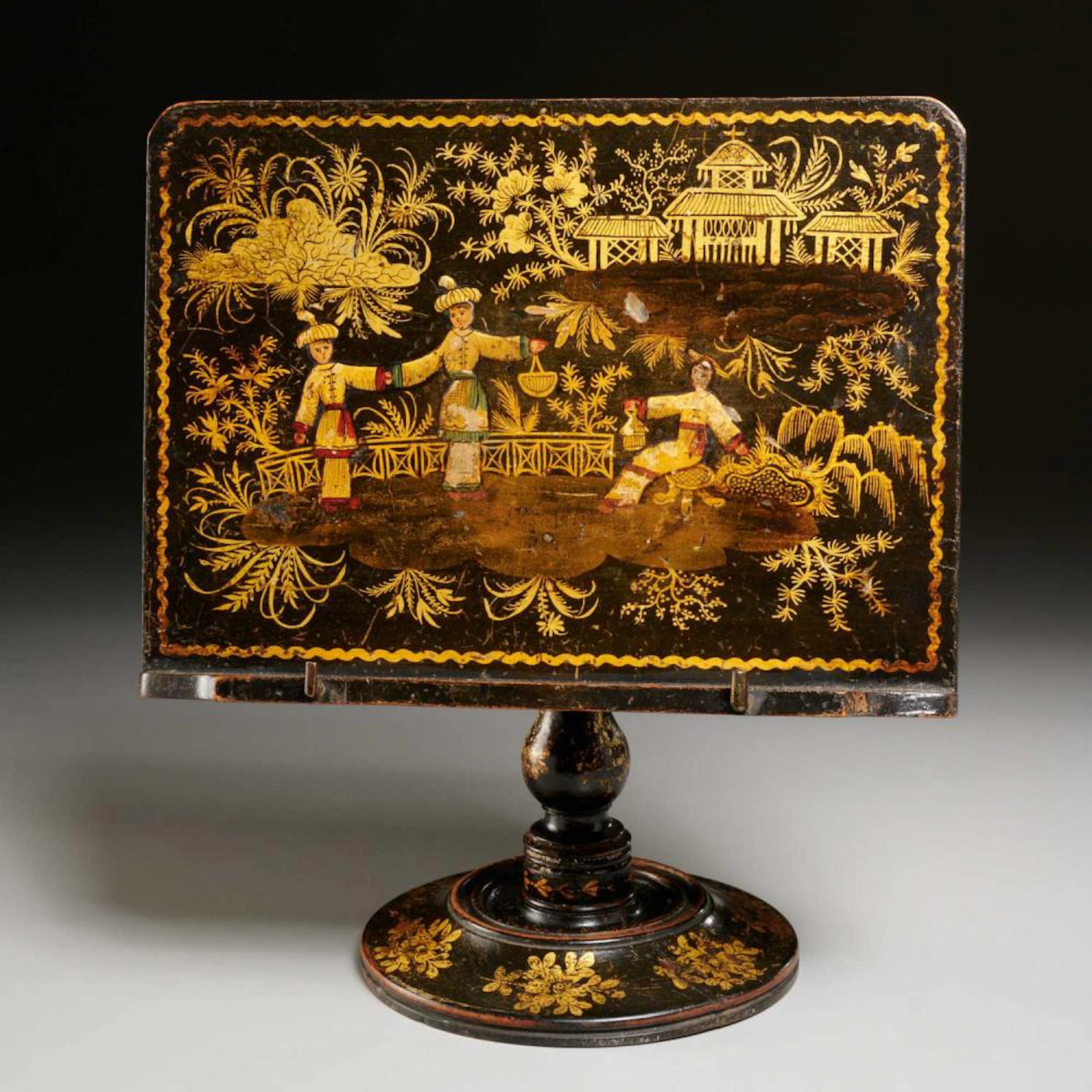 George III style black Japanned book stand