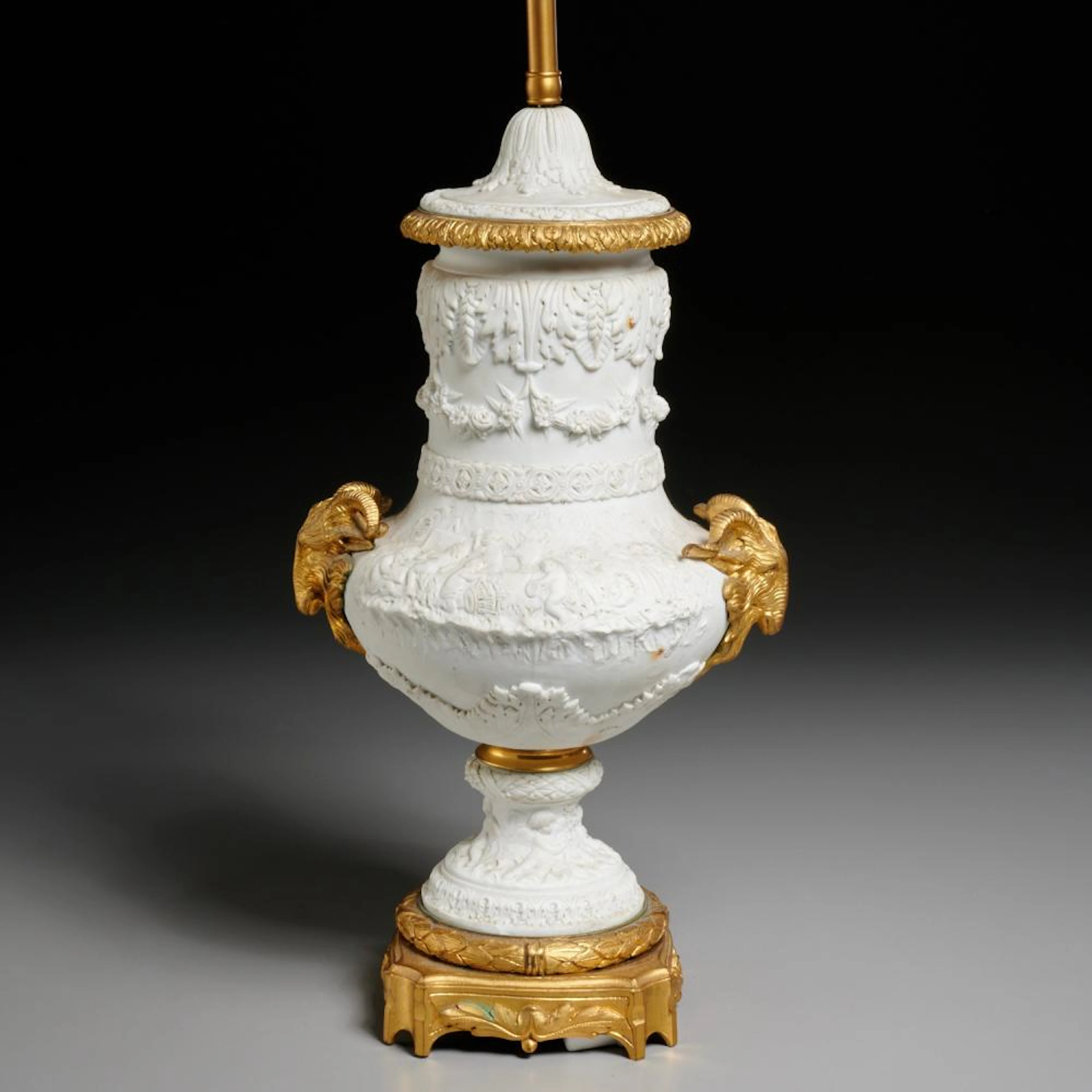 Sevres style bronze mounted biscuit urn lamp