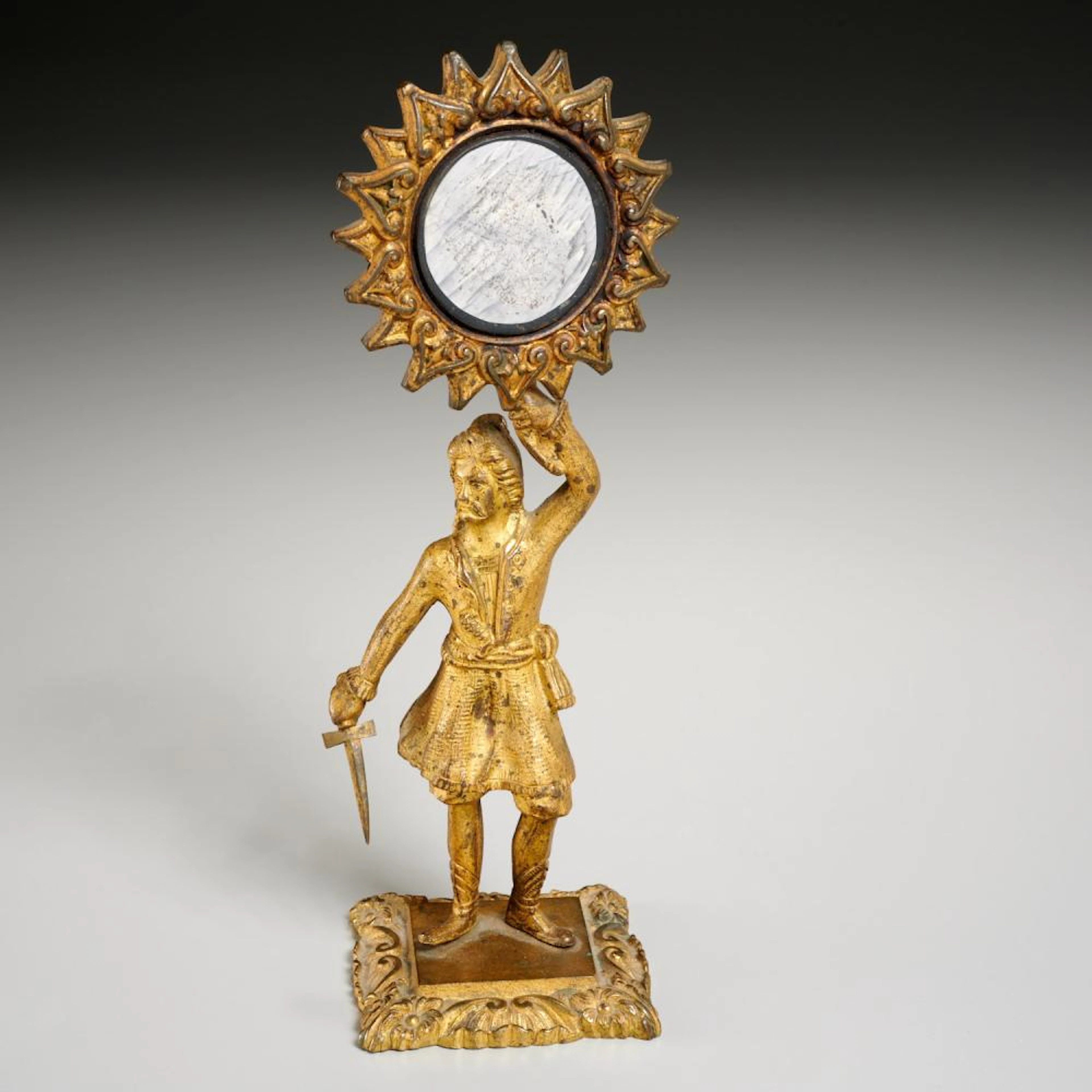 Continental gilt bronze figural mirror
