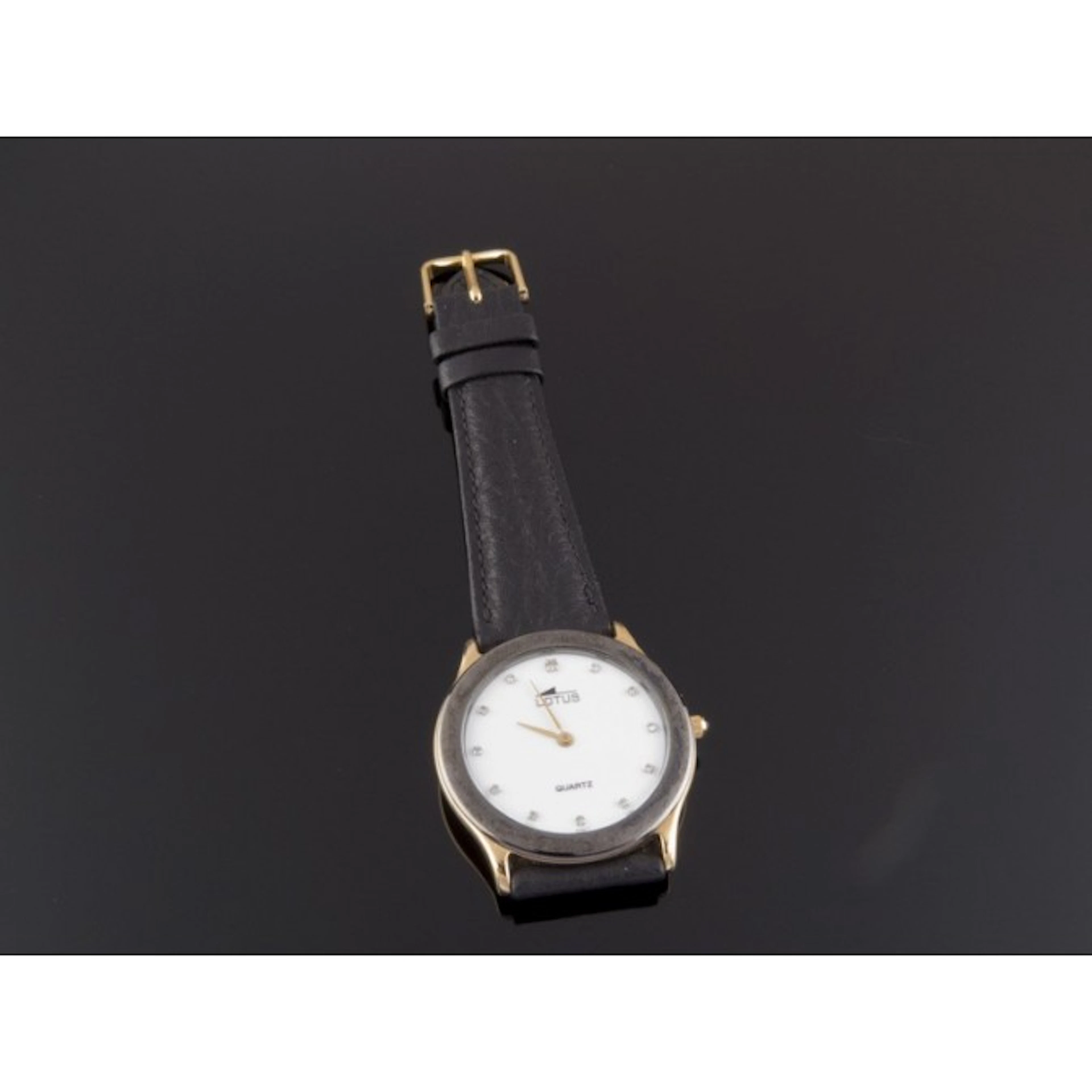 RELOJ LOTUS