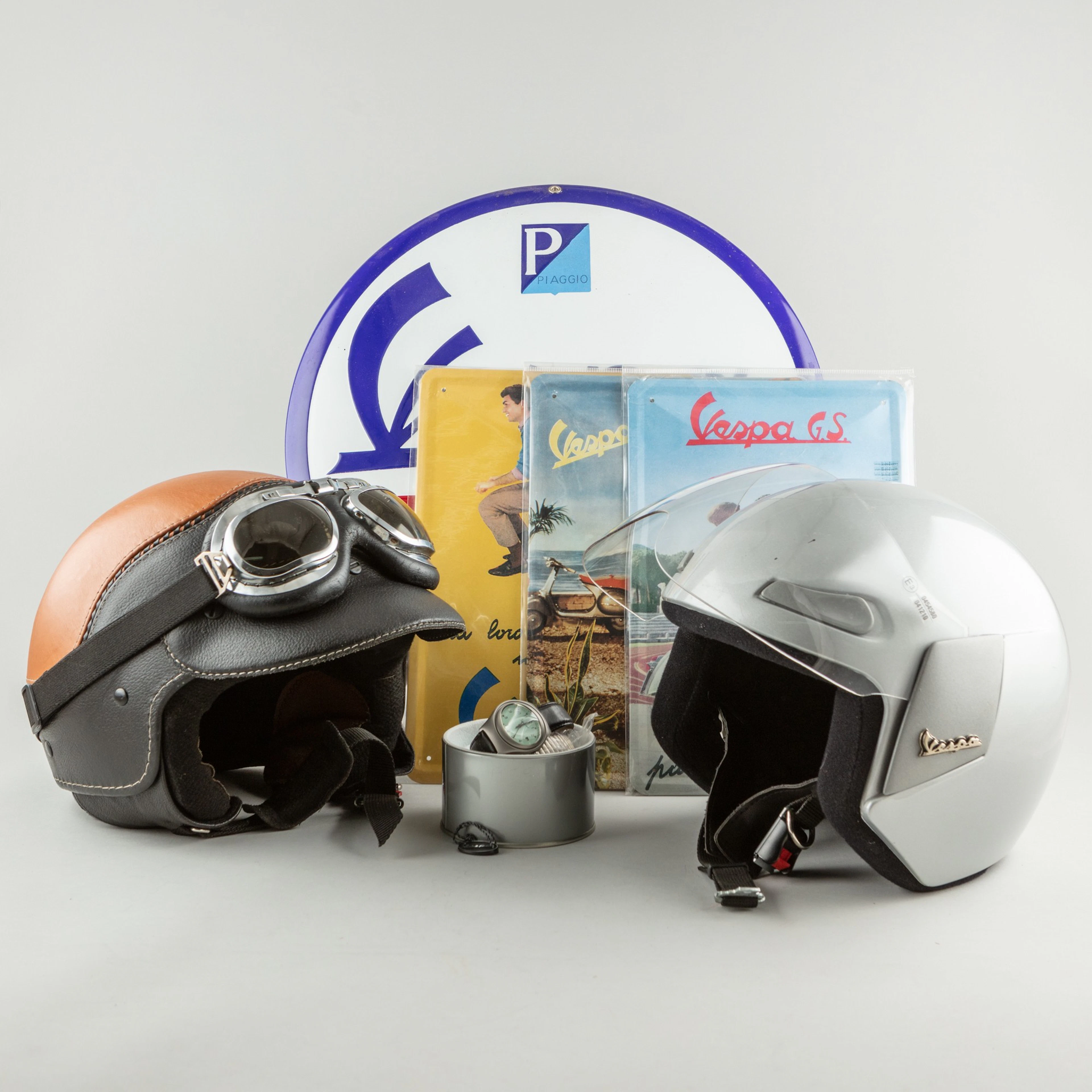 Two helmets and a bag, etc