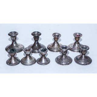 Four Pairs Weighted Sterling Console Candlesticks