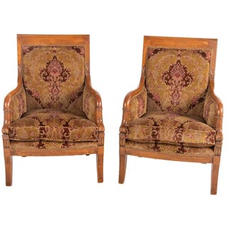 A Pair of Continental Carved Armchairs