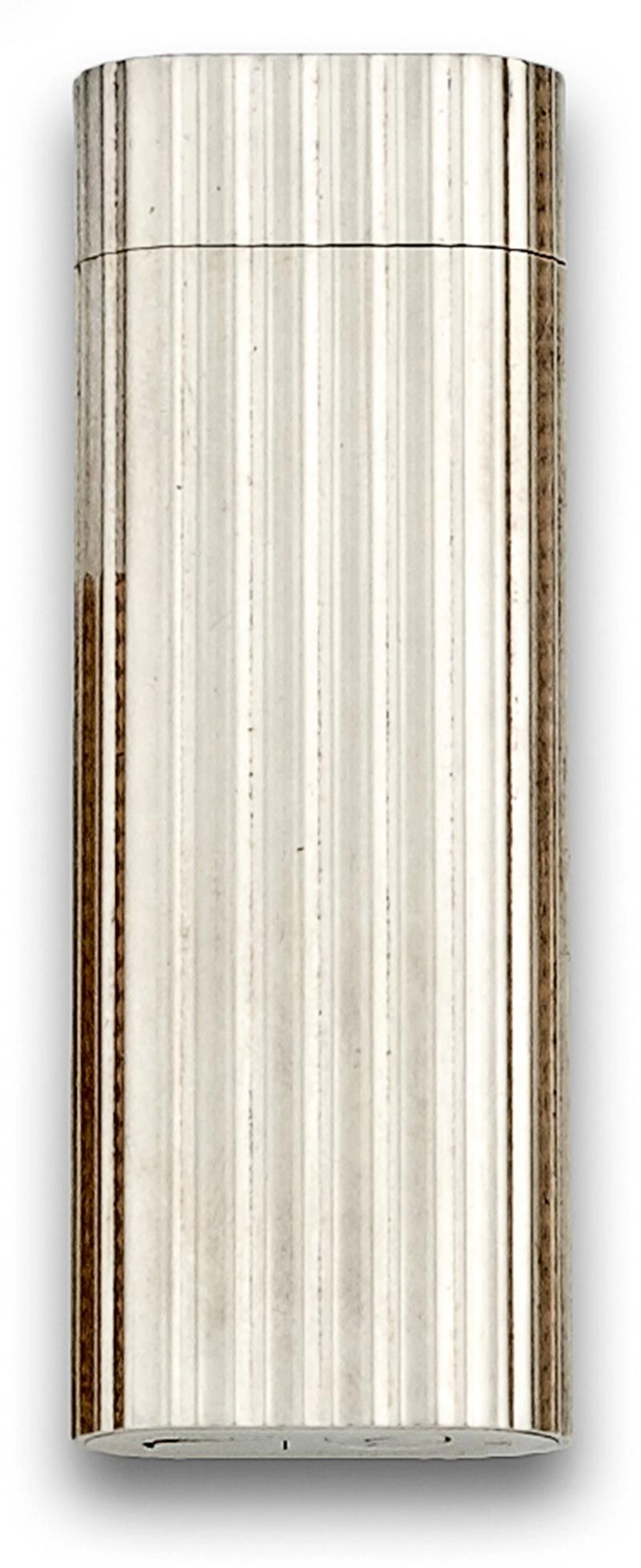 Encendedor CARTIER en plata con decoracin gallonada.24120D.