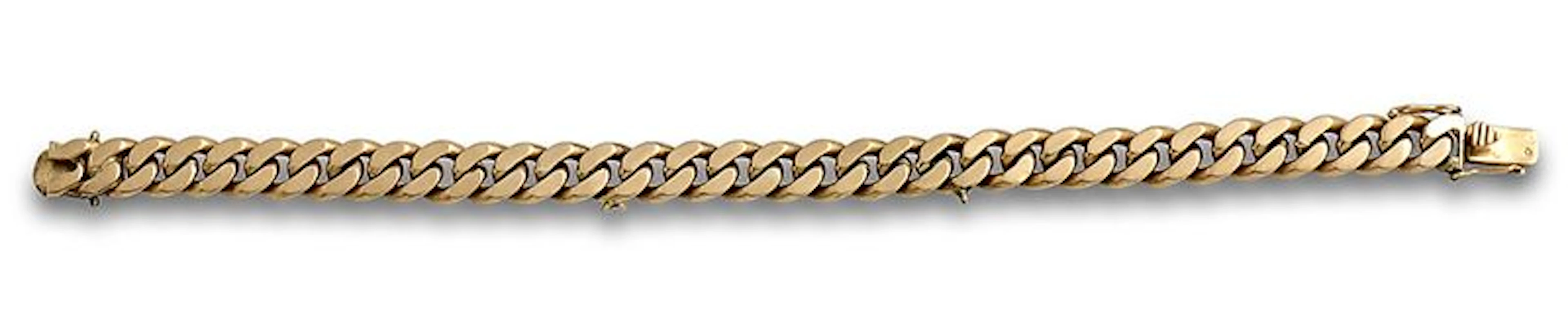 Pulsera de eslabn barbado macizo en oro de 18K.