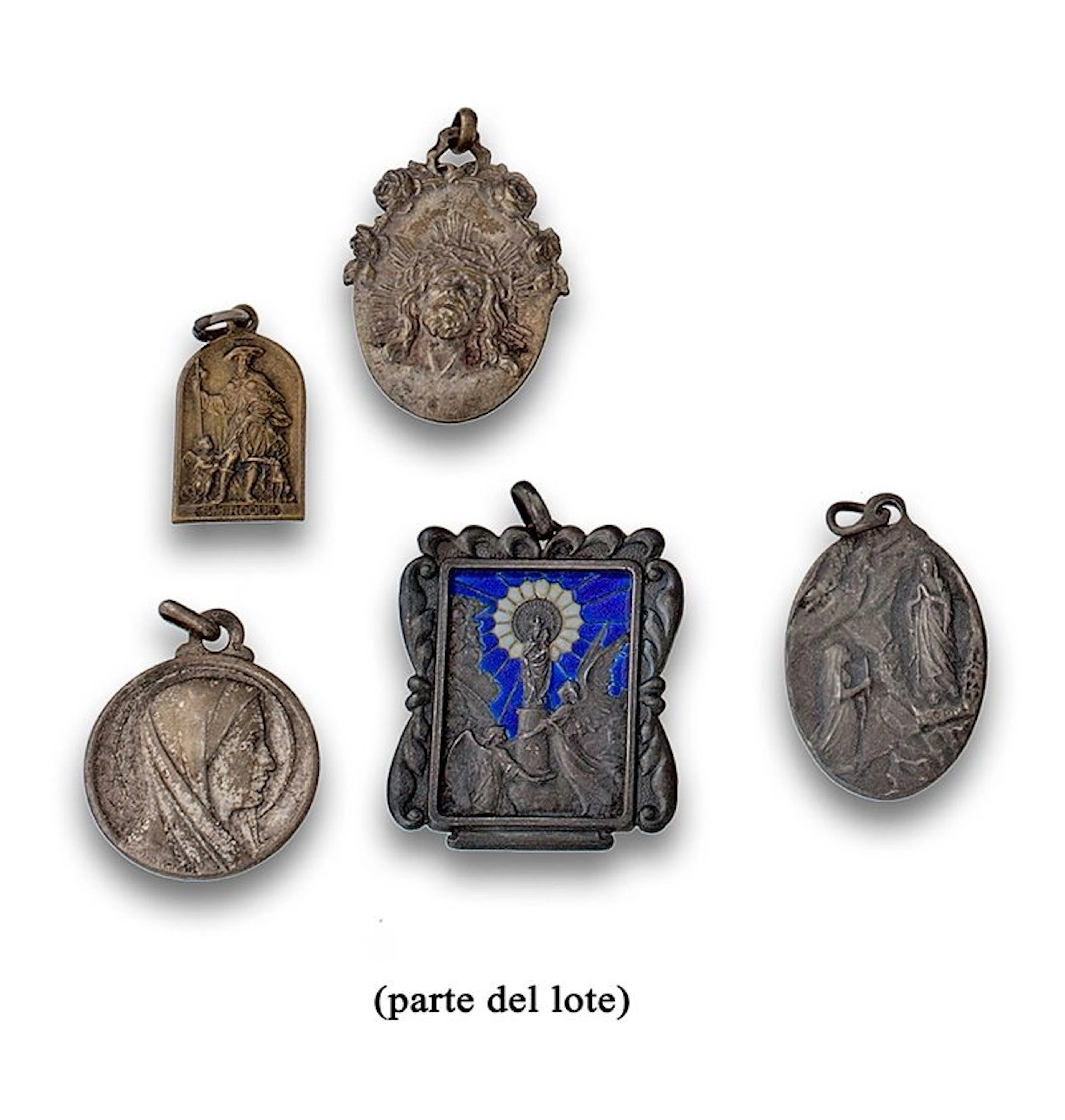 Lote de medallas realizadas en plata y metal de pps s XX.