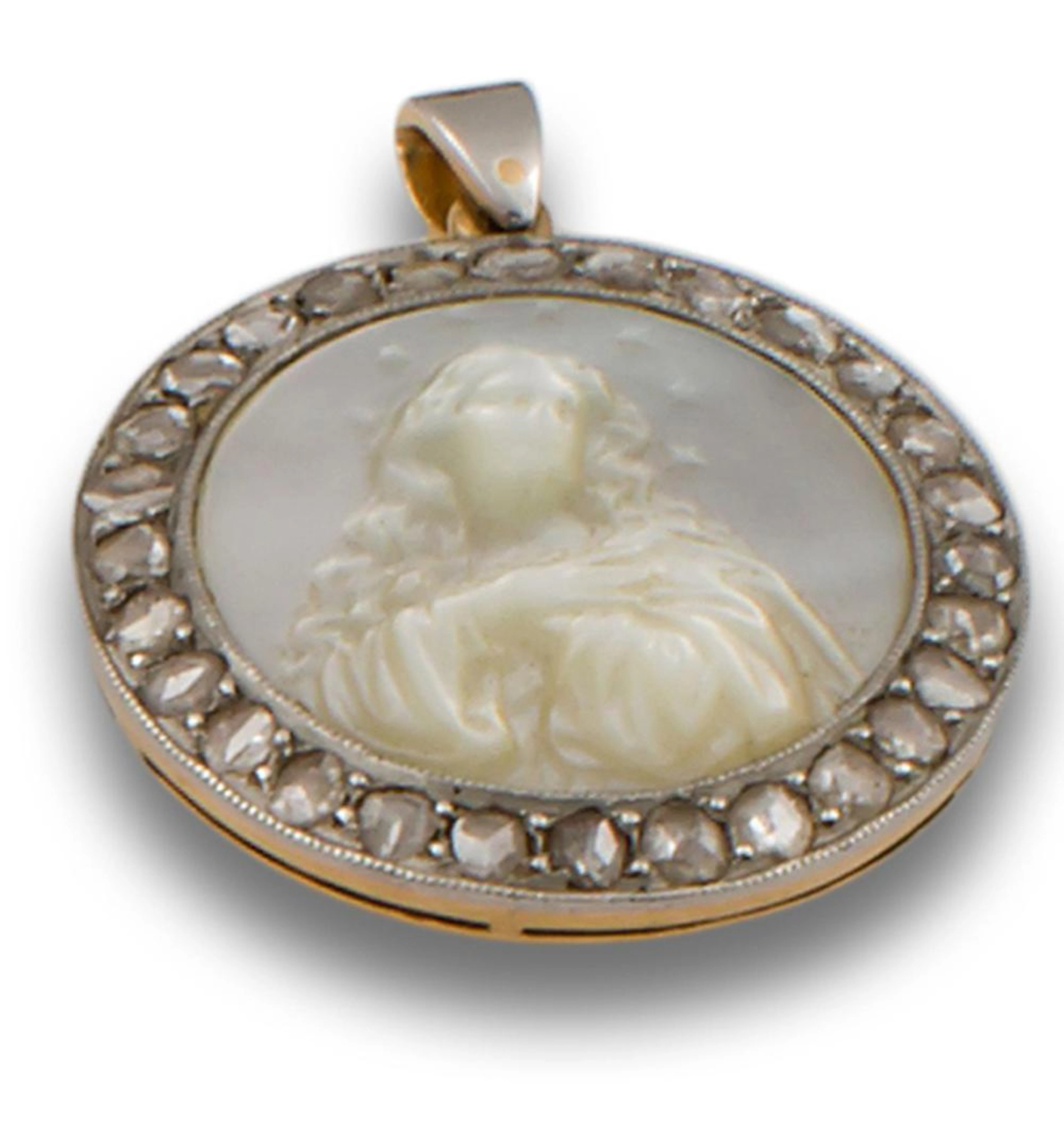 A VINTAGE MOTHER-OF-PEARL AND DIAMOND MEDALLION PENDANT