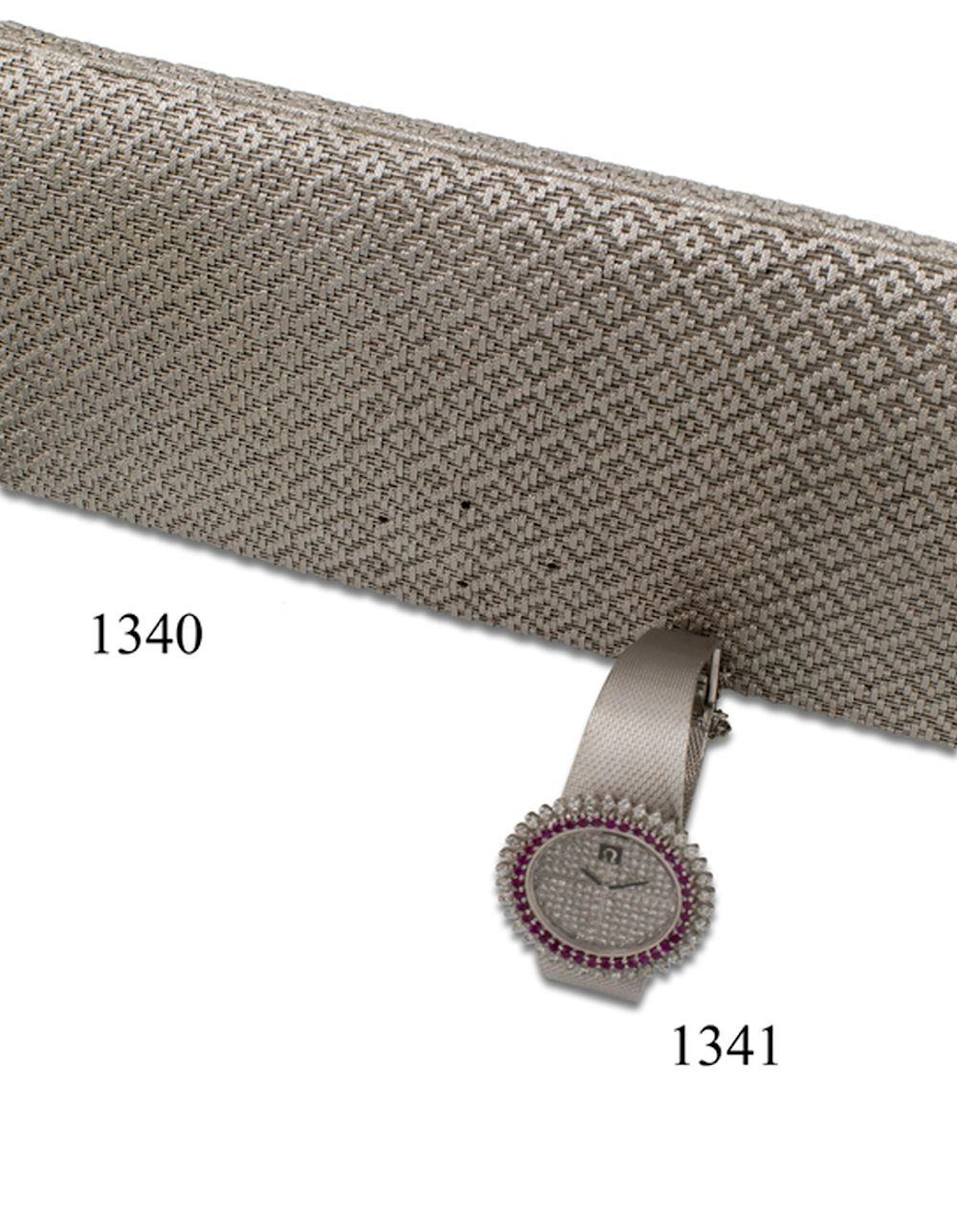 A VINTAGE WHITE GOLD TROUSSEAU