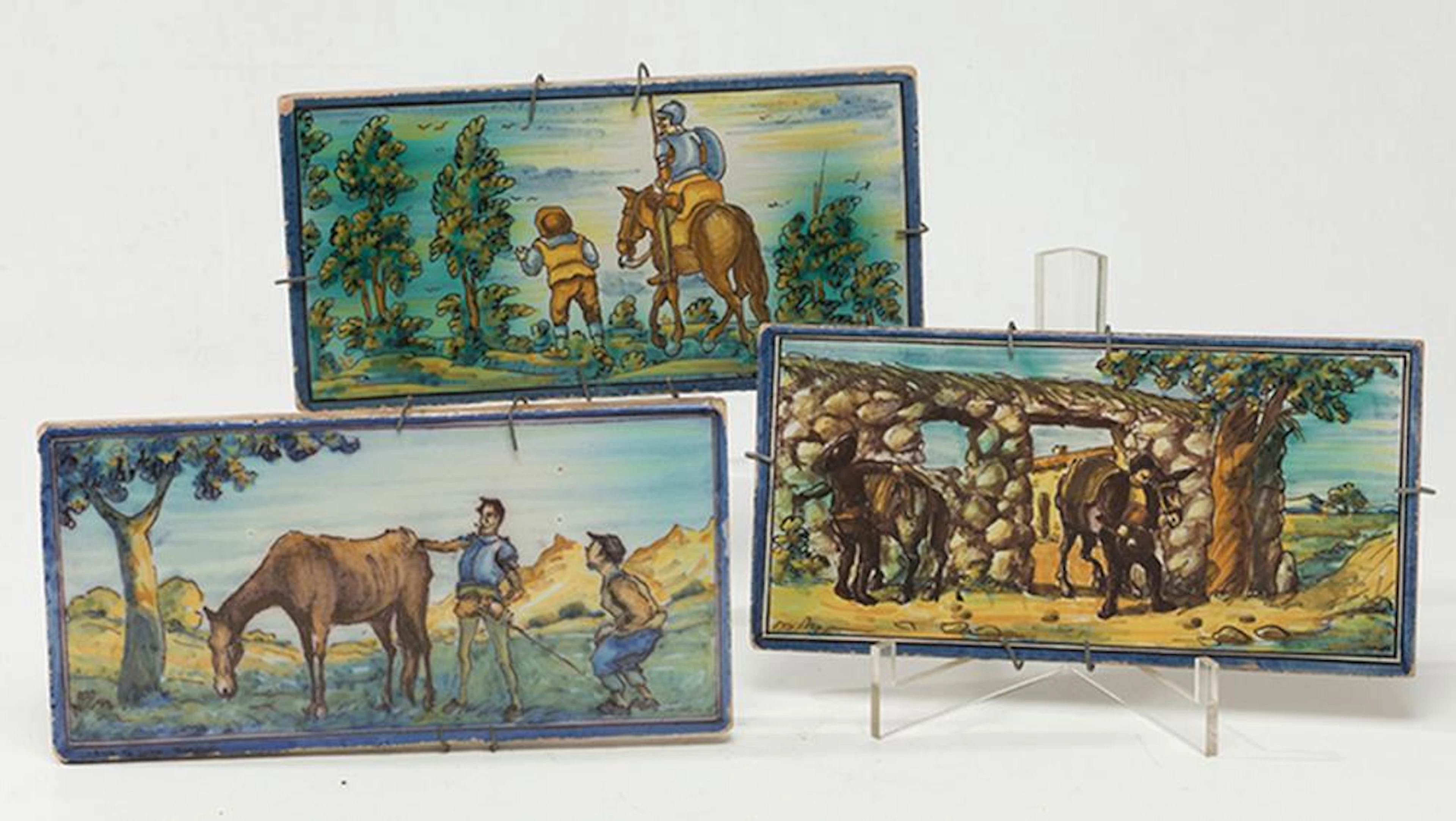 Tres placas de cerámica de Talavera Don Quijote