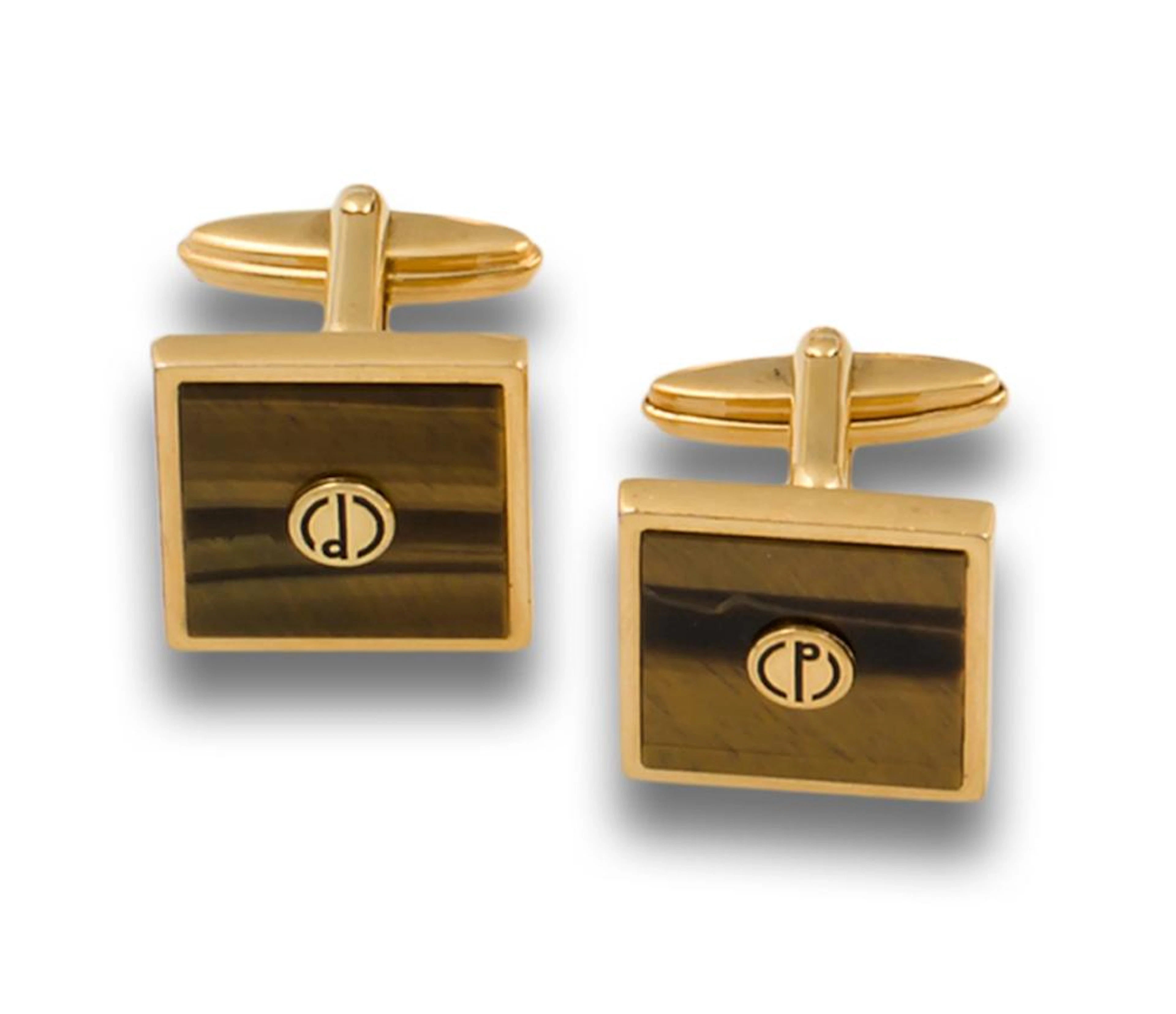 A PAIR OF GILT SILVER AND TIGER'S EYE CUFFLINKS, BY DUNHILL