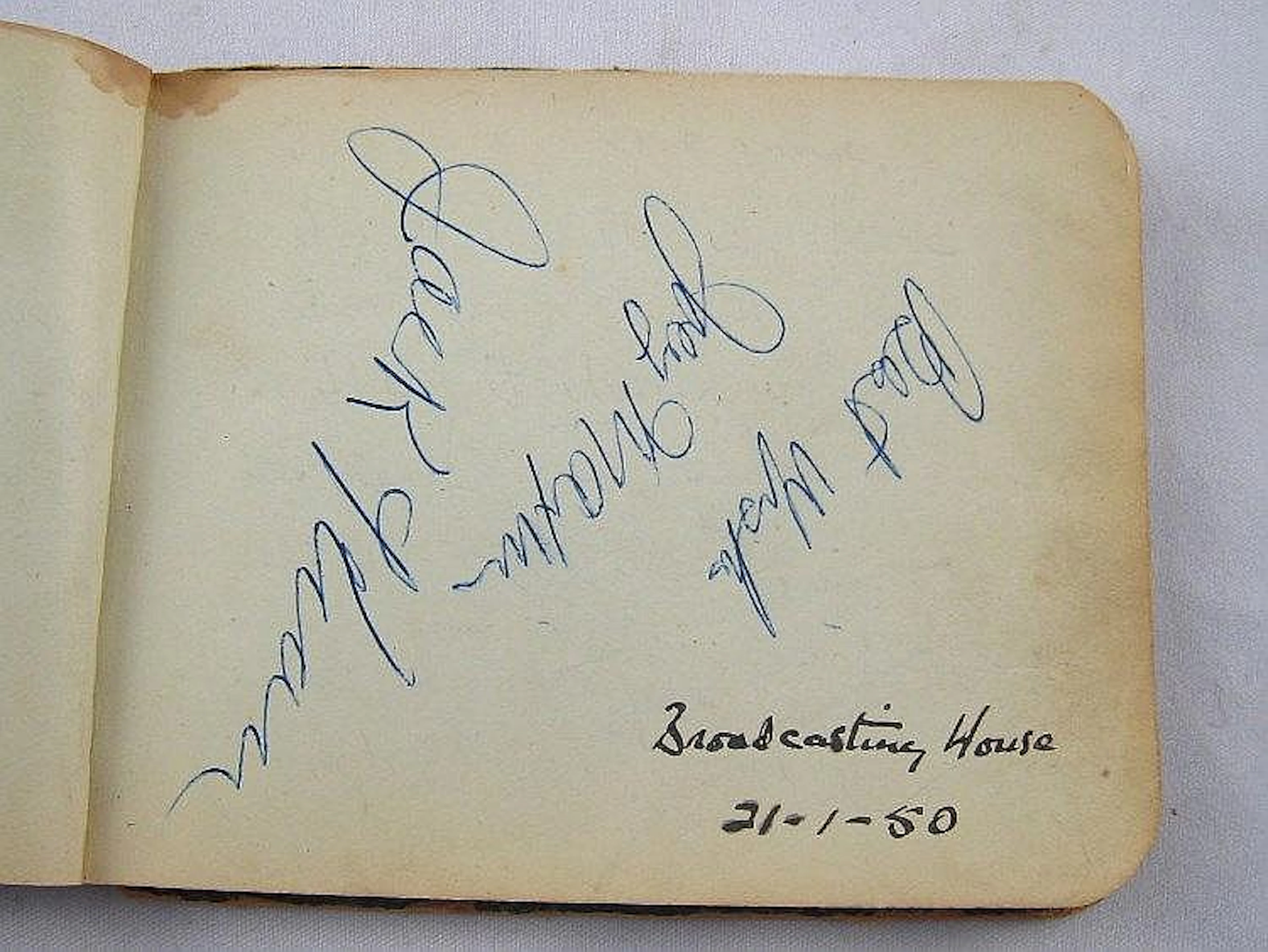 A small autograph book with signatures of Bob Hope
