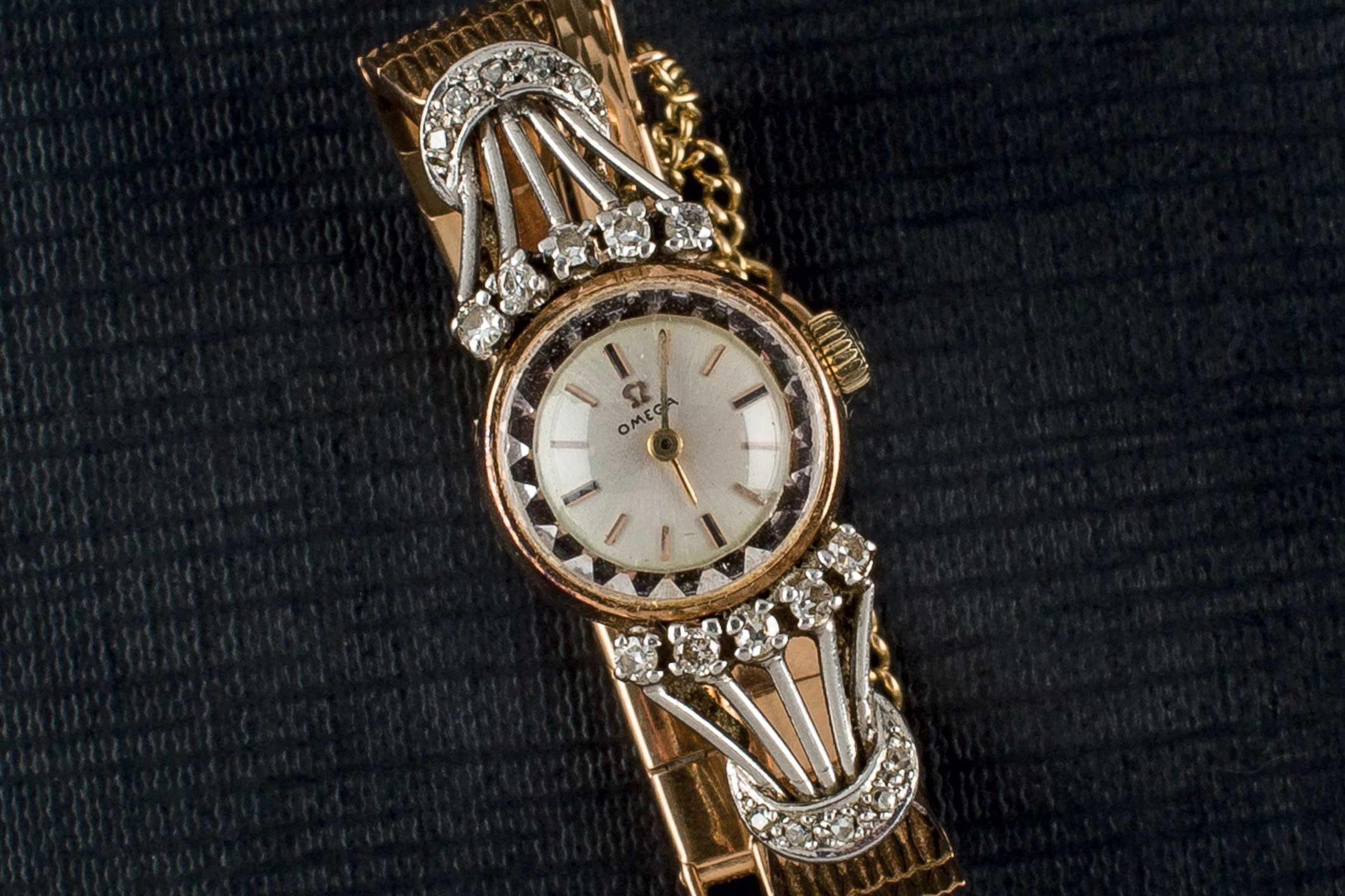 Reloj Omega de oro y diamantes