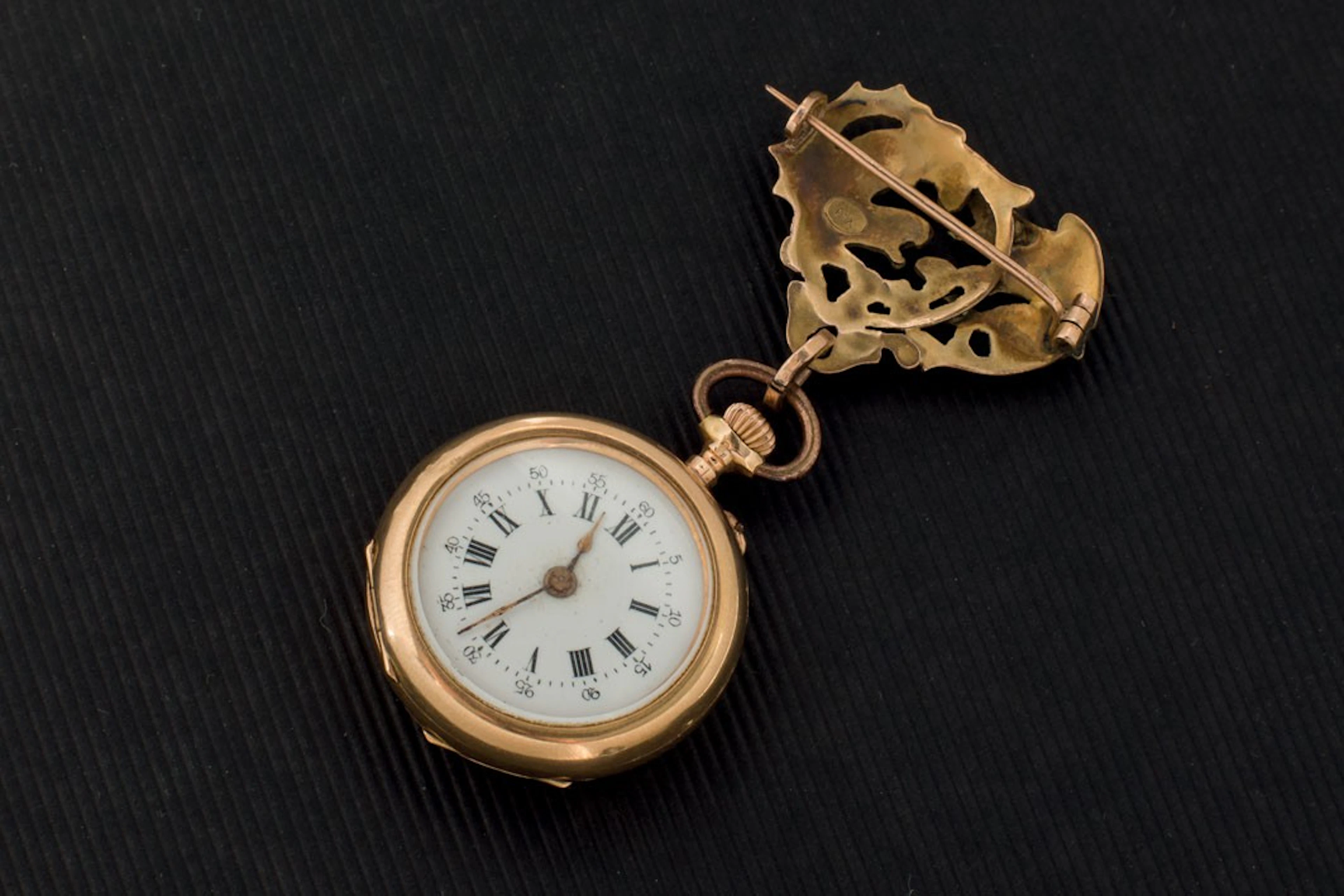 Reloj de colgar en oro de 18K