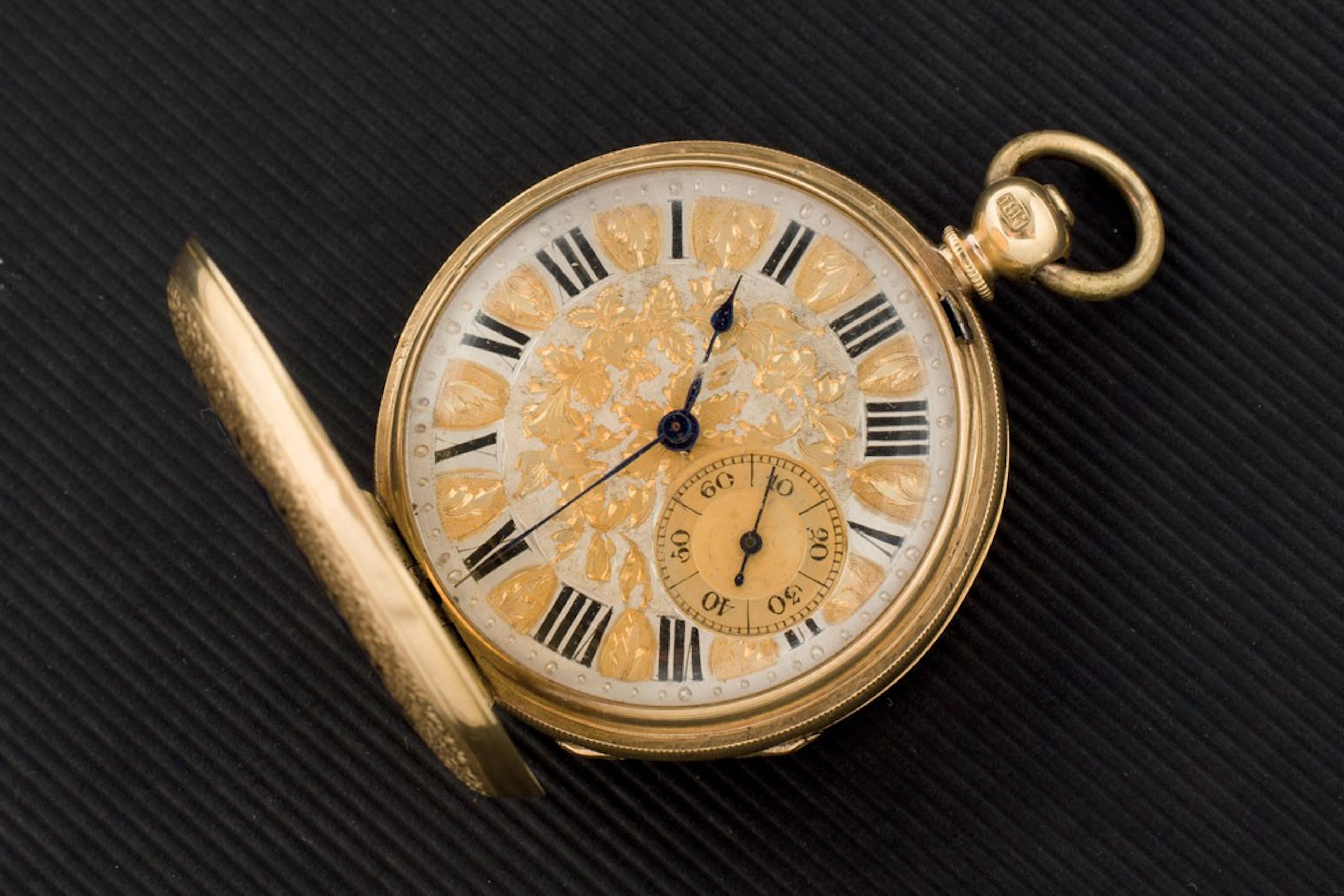 Reloj ginebrino de colgar en oro de 18K