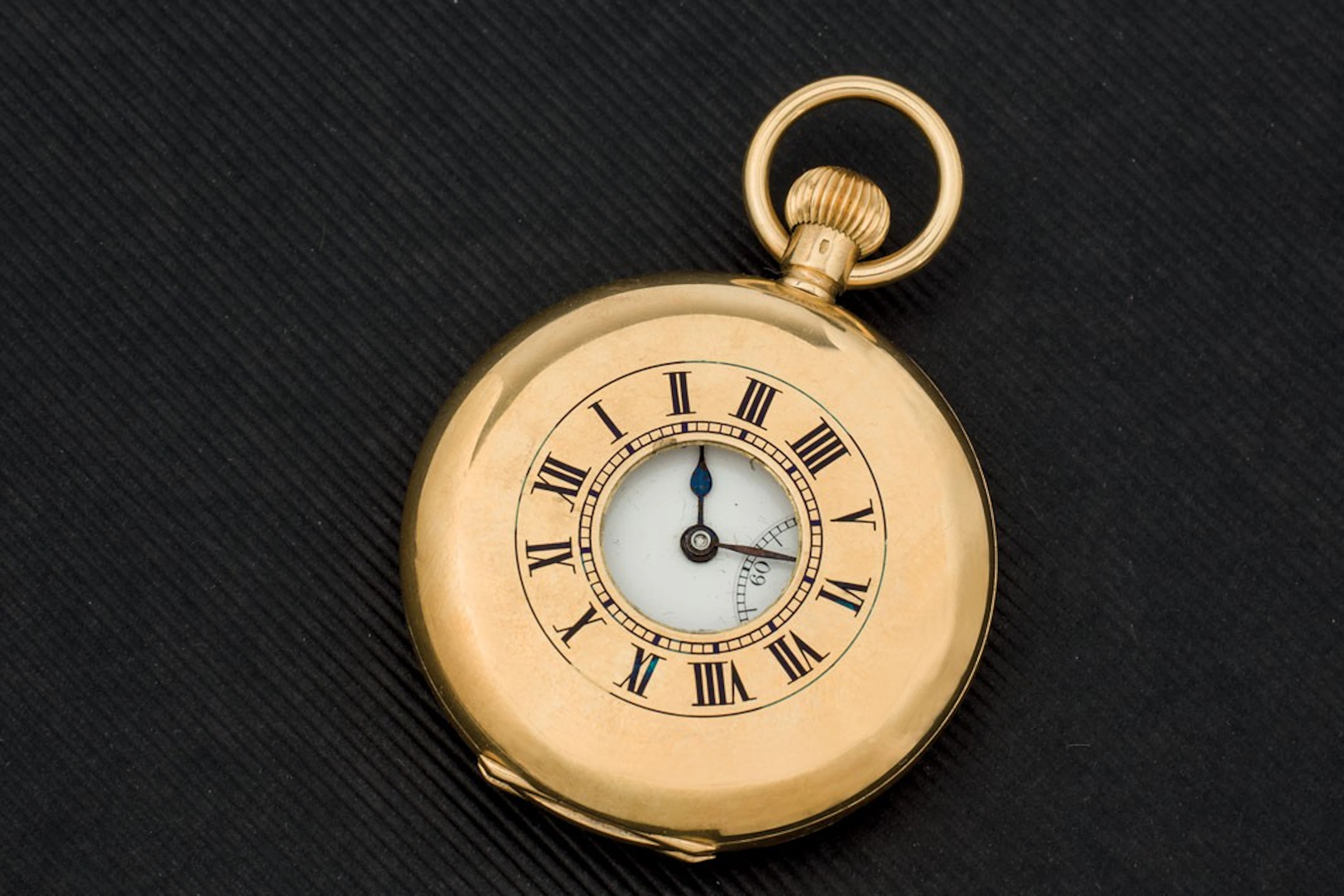 Reloj de cazador en oro de 18K