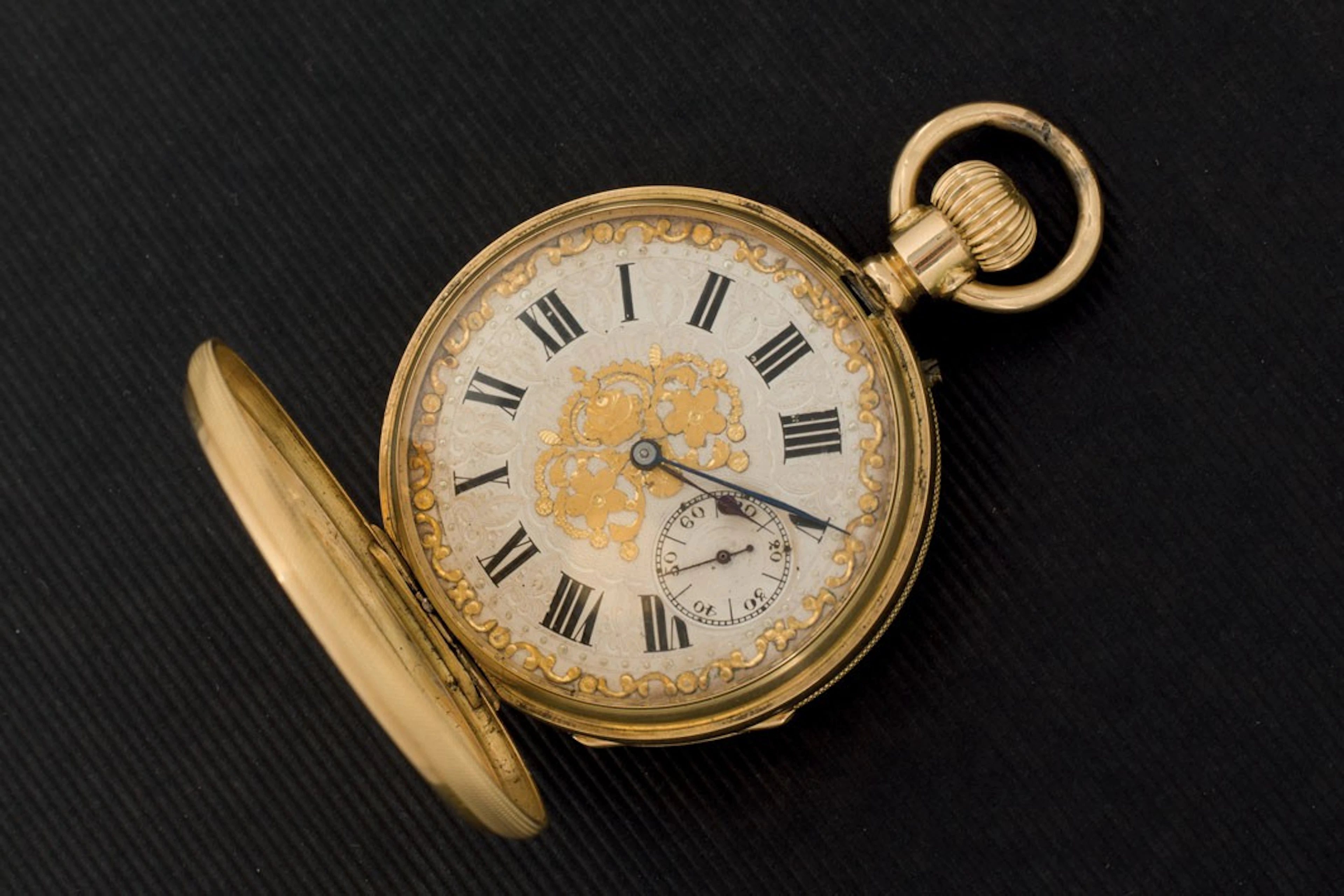 Reloj suizo de bolsillo en oro de 18K