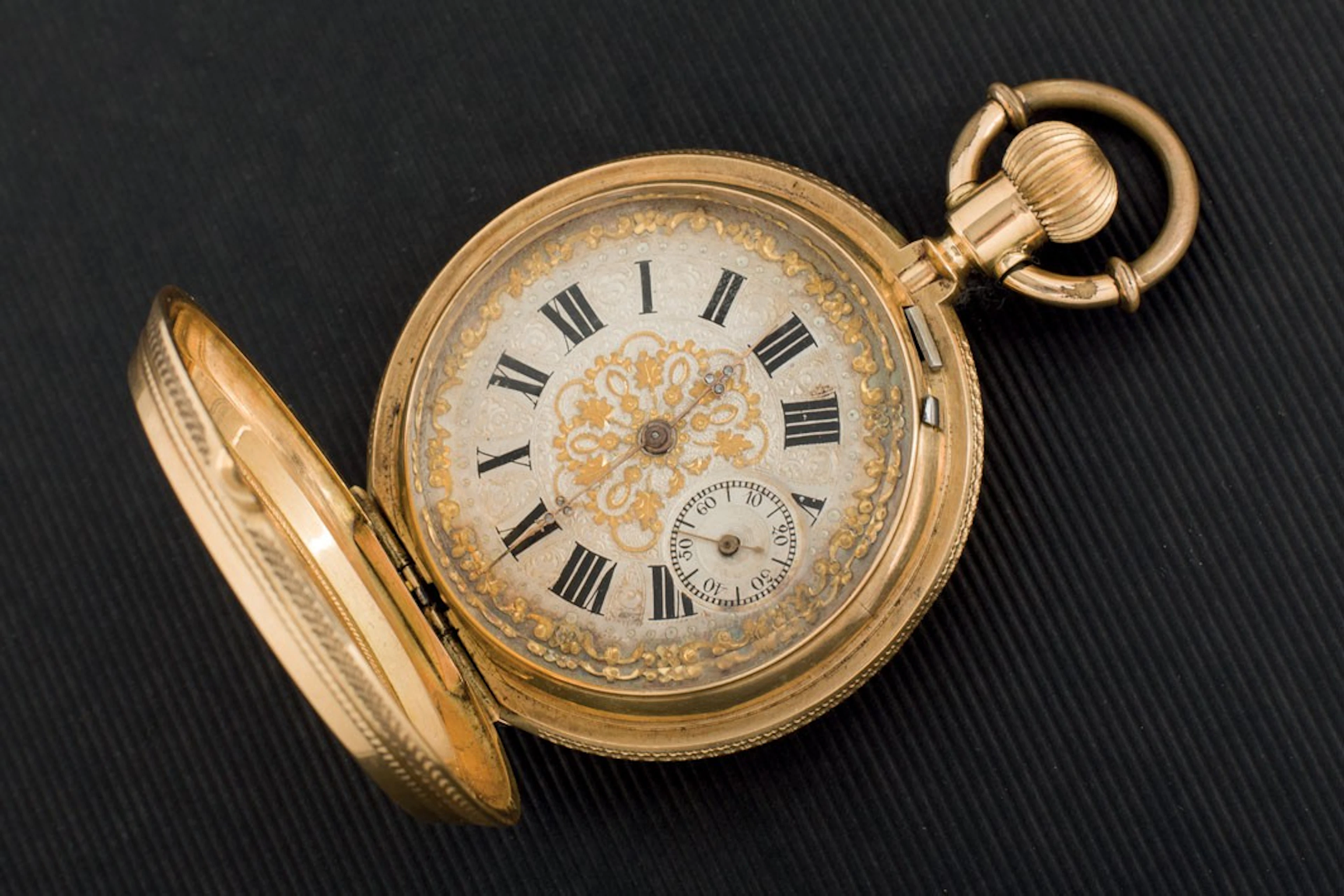 Reloj suizo de bolsillo en oro de 18K