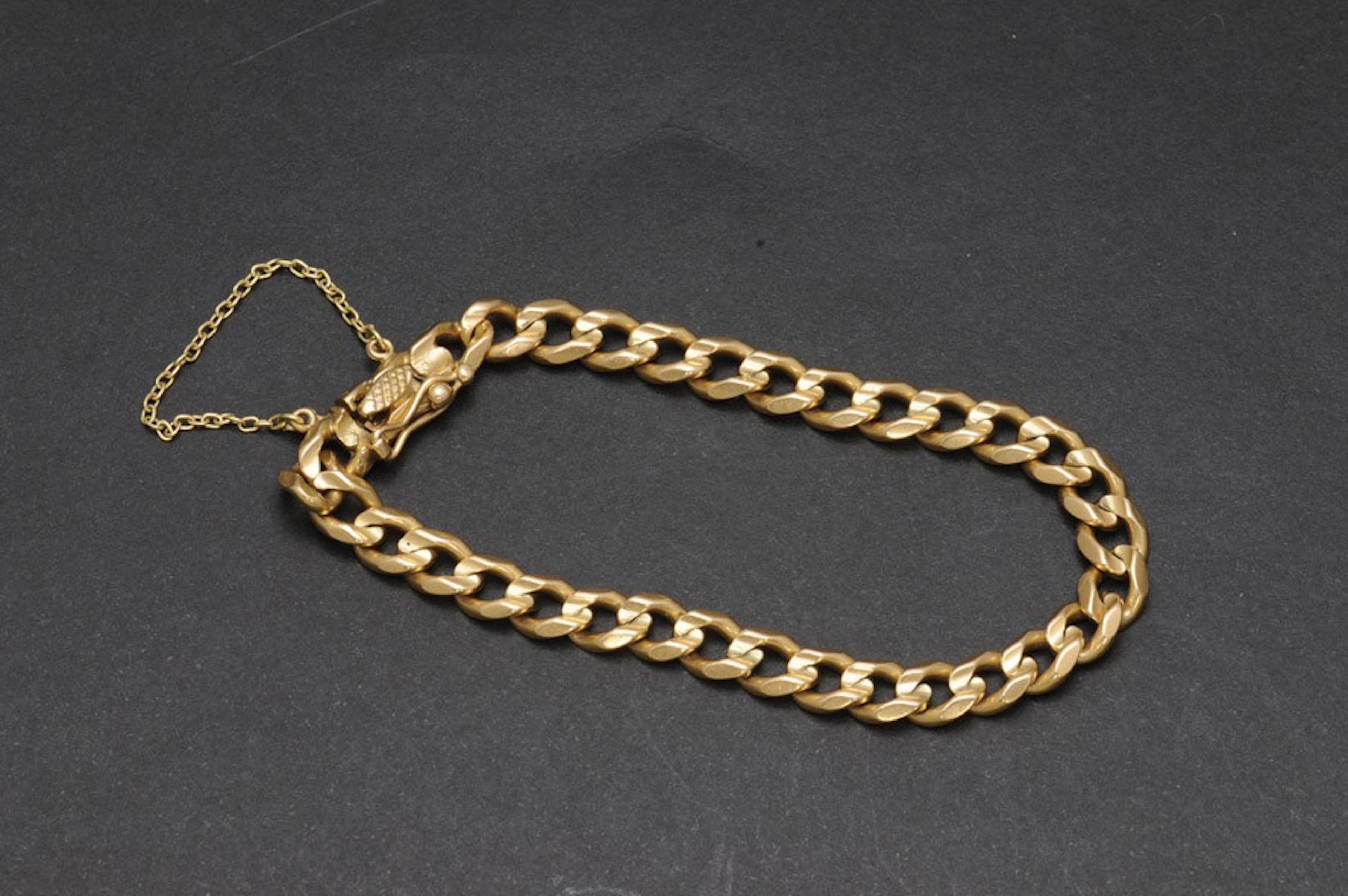 Pulsera de oro con eslabones barbados