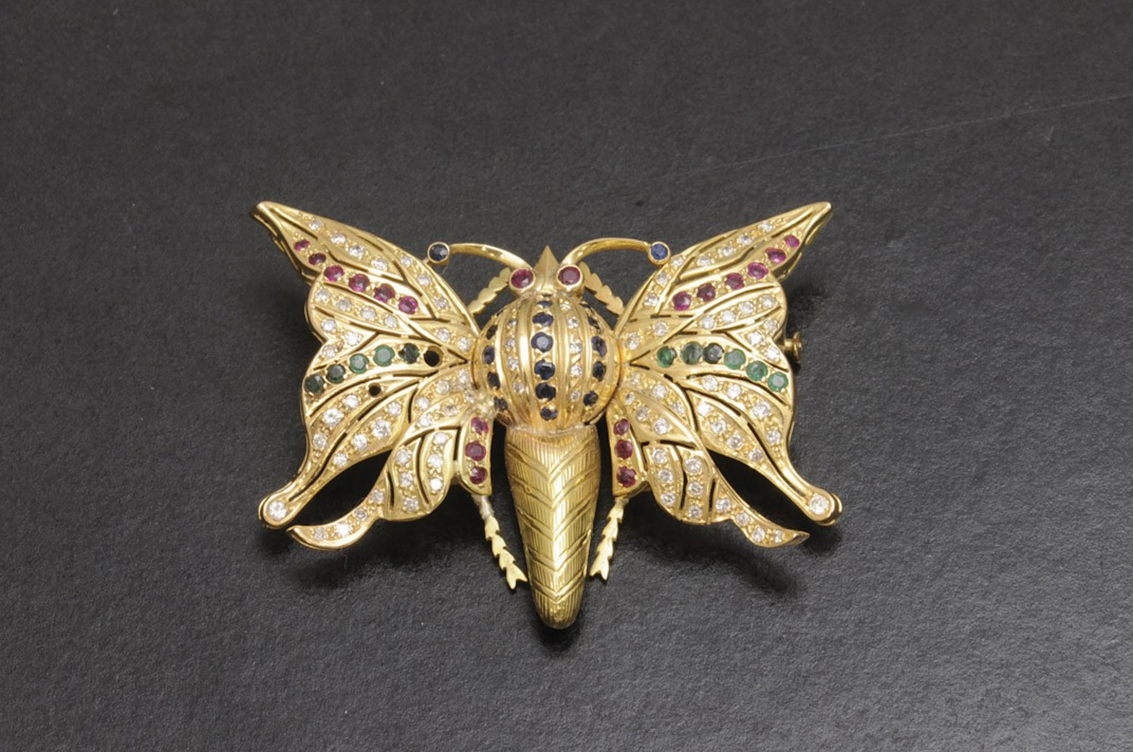 Broche mariposa de oro con diamantes