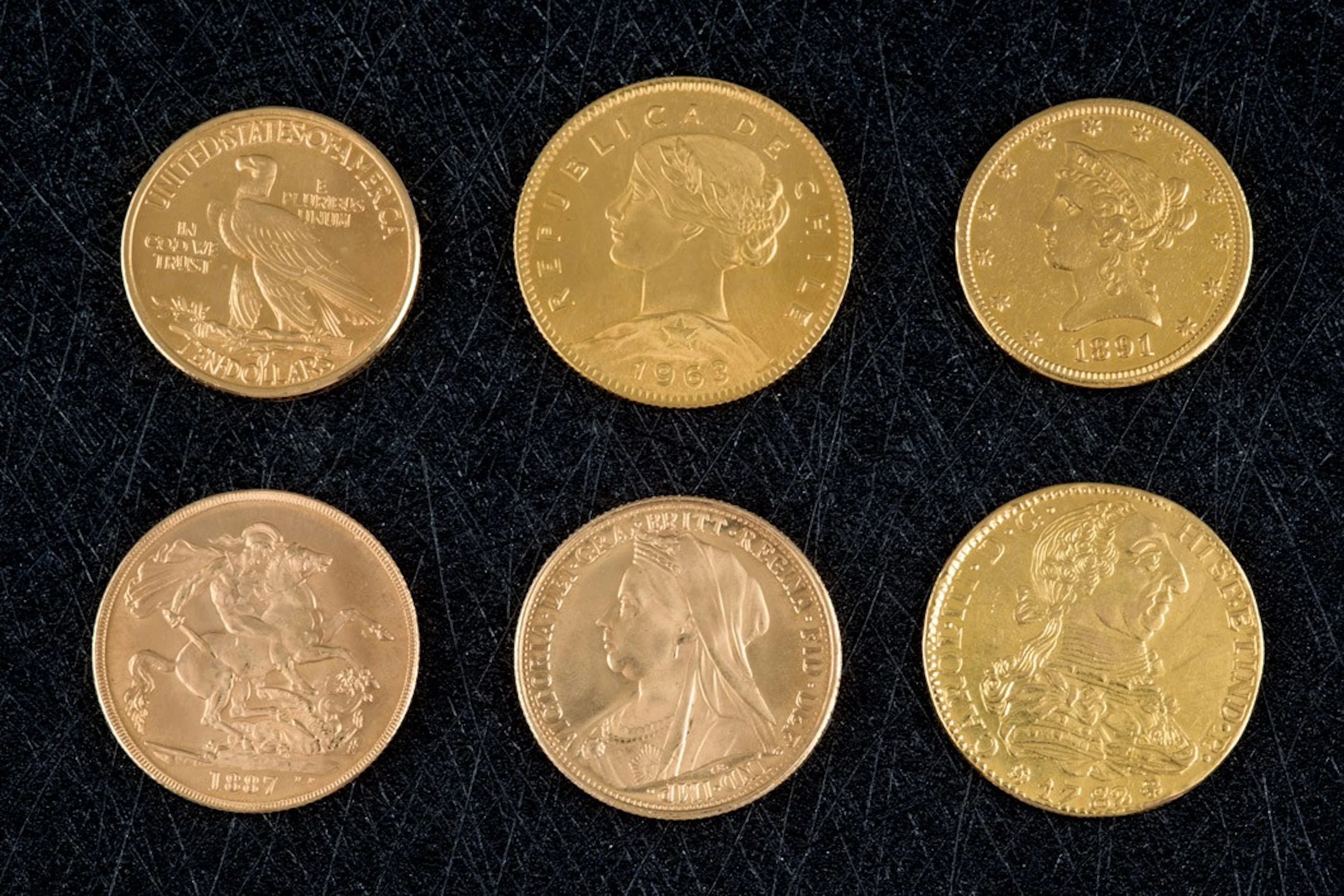 Lote de 24 monedas y medallas de oro