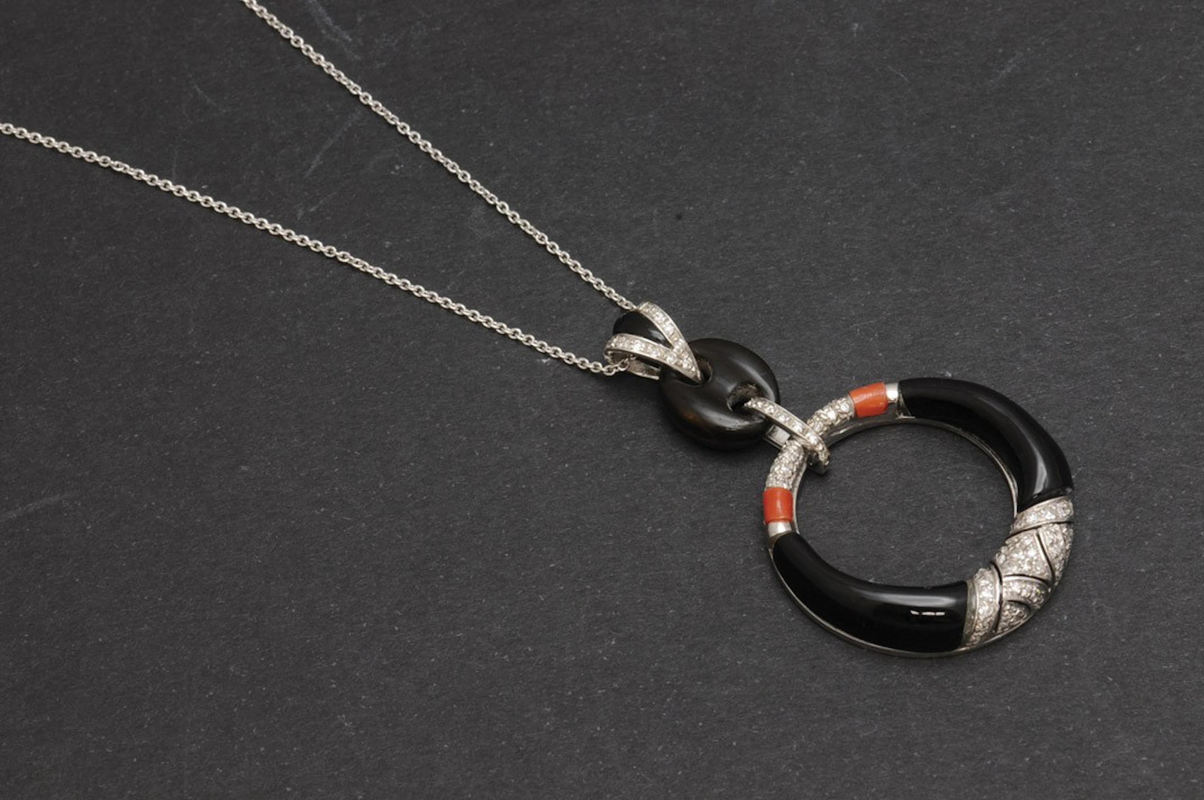 Colgante de coral, onix y diamantes