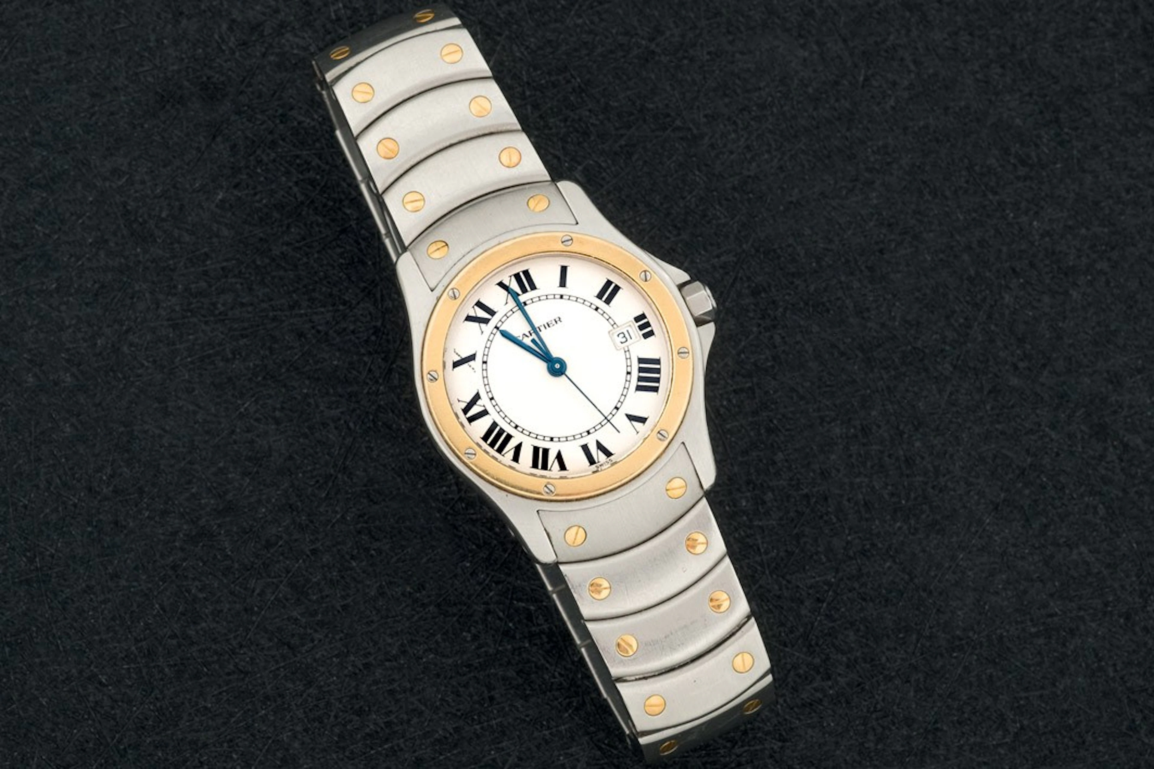 Cartier Santos redondo de acero y oro