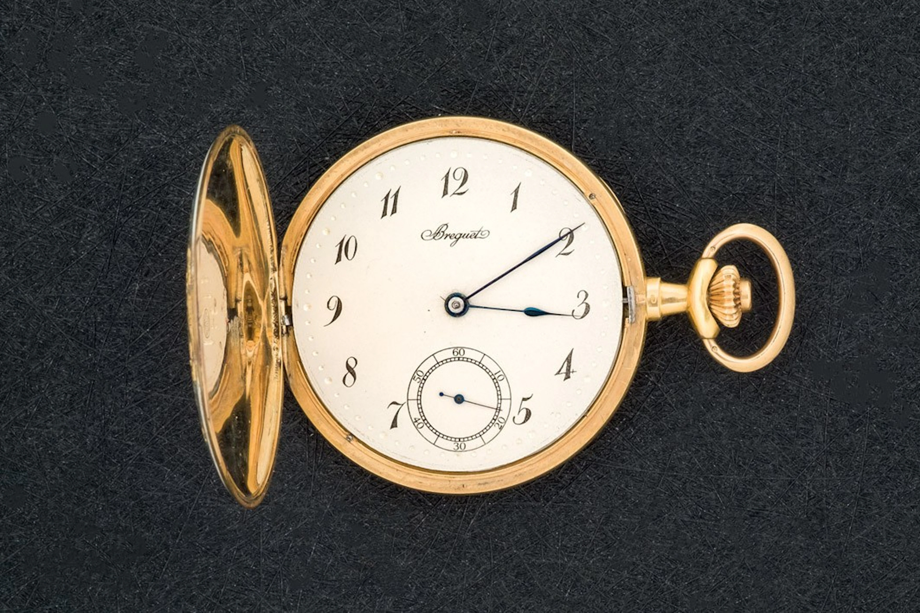 Reloj de bolsillo de oro con esmaltes