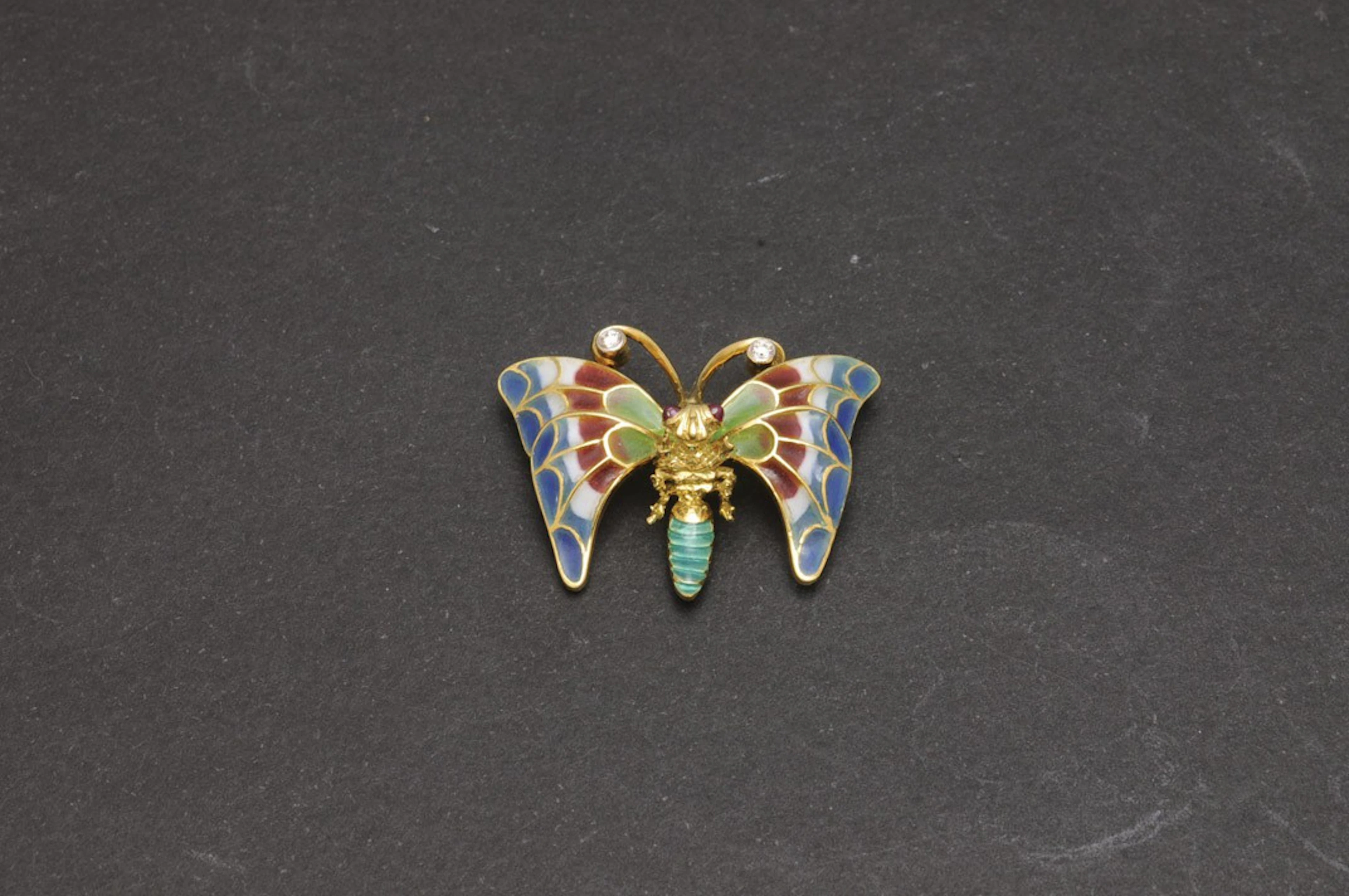 Broche mariposa de oro con esmalte y diamantes