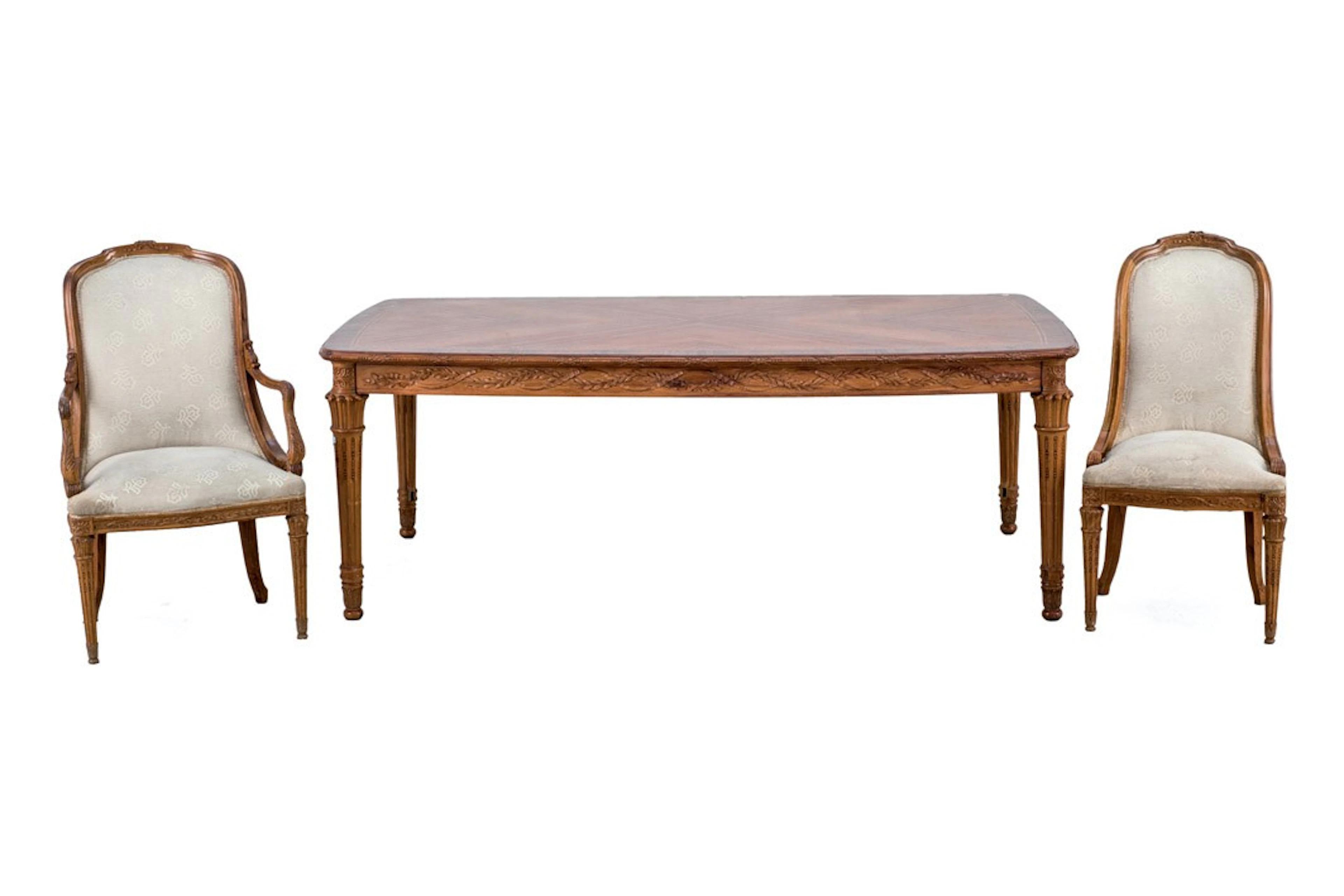 Mesa de comedor con seis sillas y dos butacas