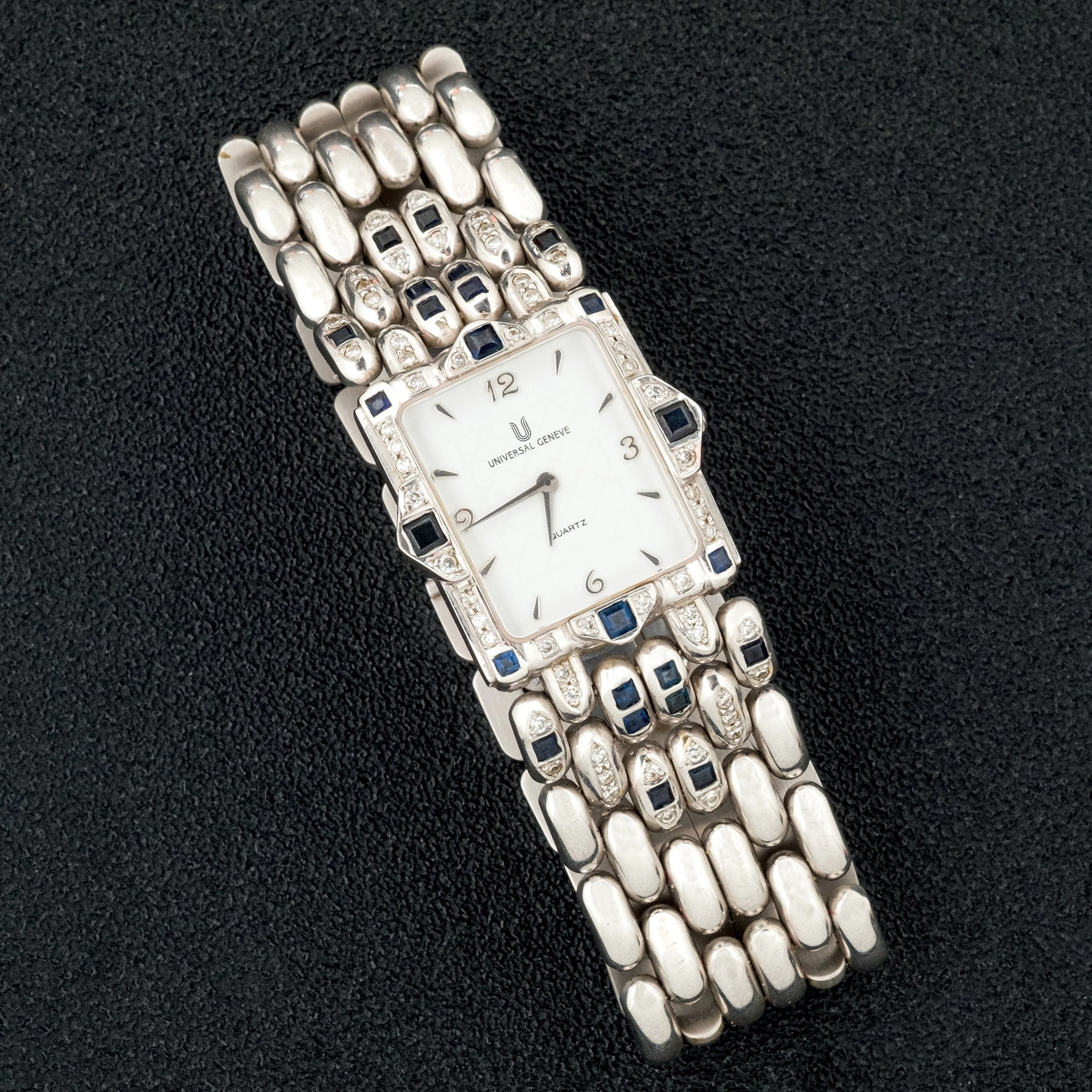 Reloj Universal Geneve de oro con diamantes