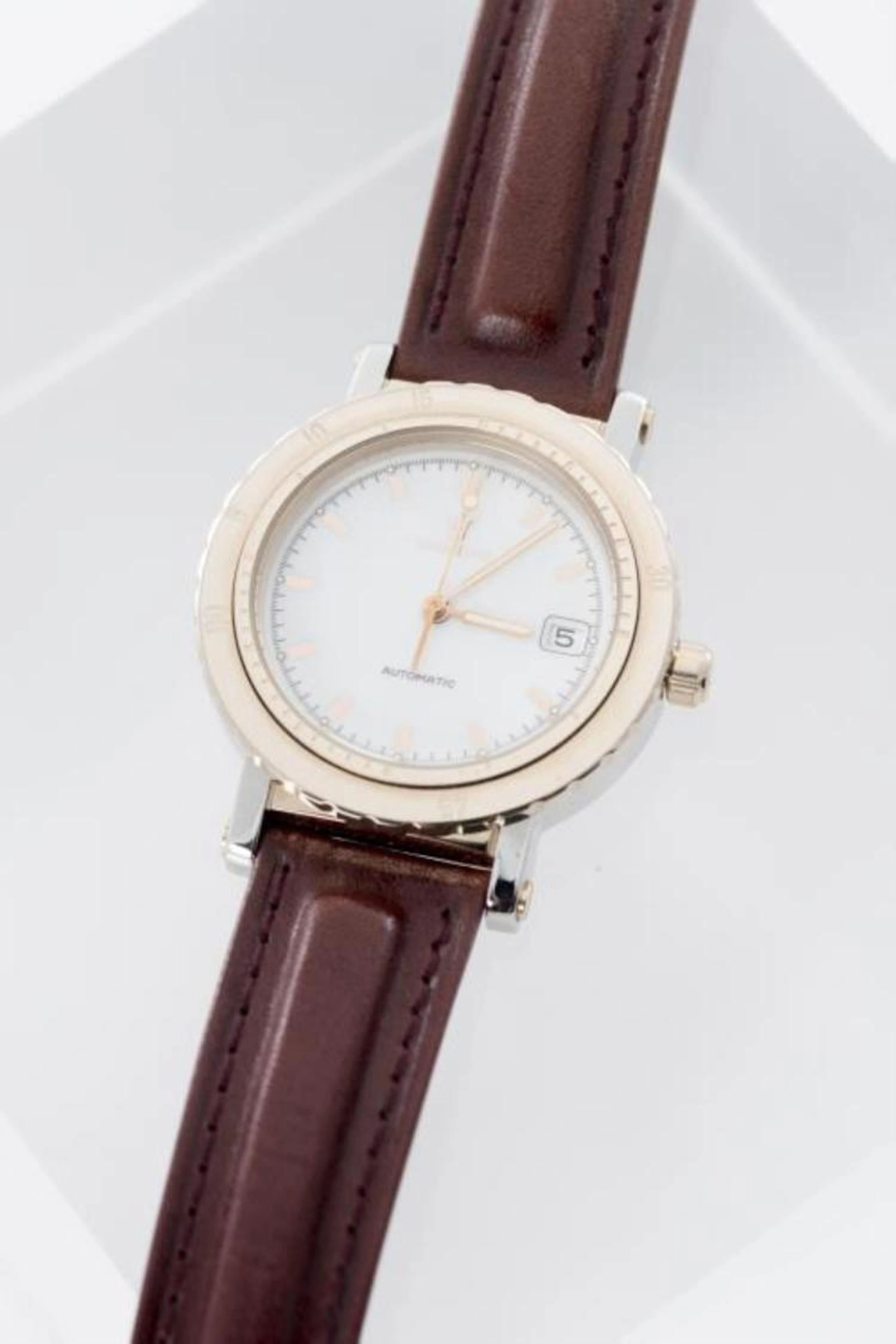 Maserati, montre bracelet homme automatique en acier doré.