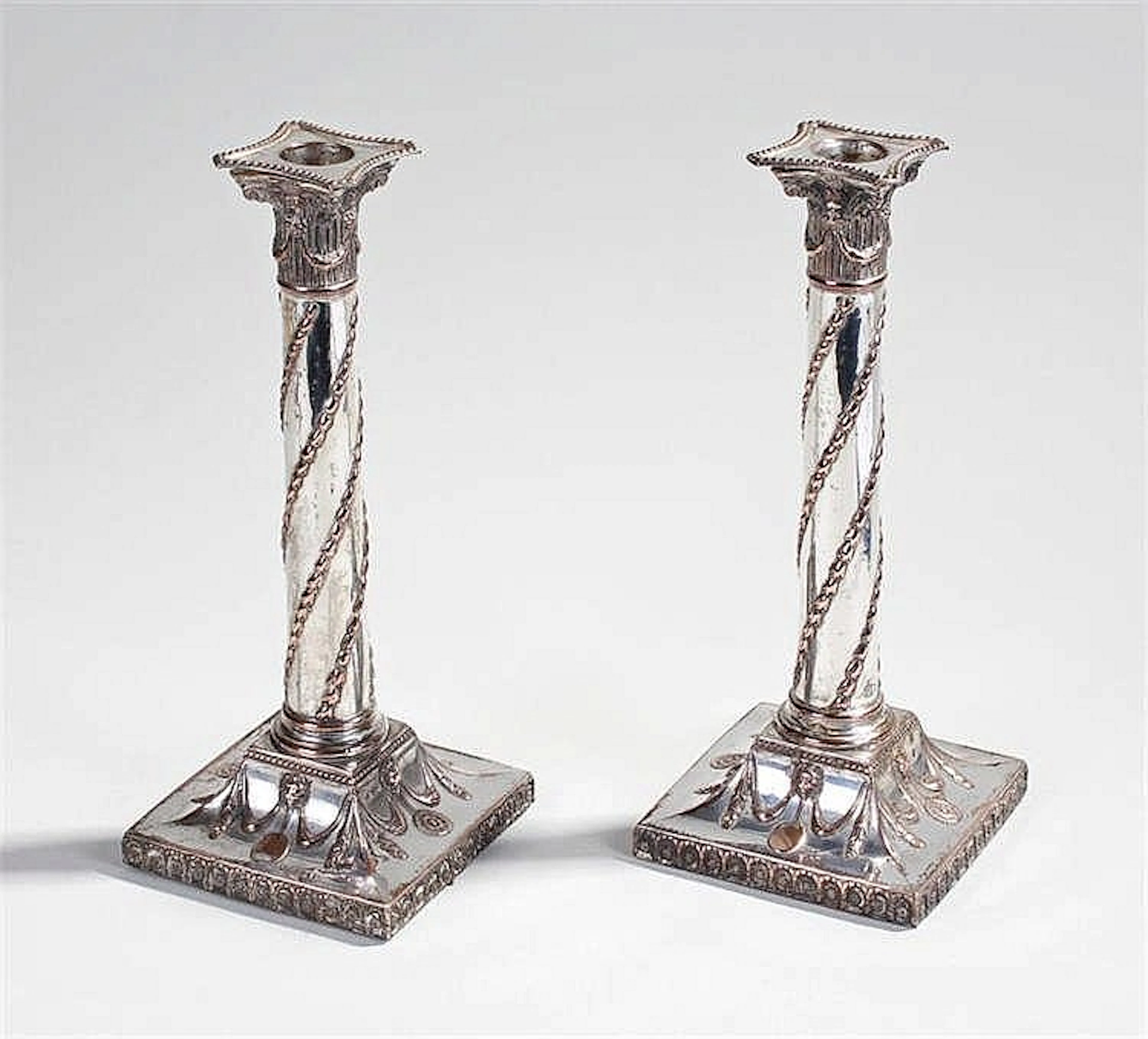 Pair of Sheffield plate candlesticks with wreathed columns possibly by Matt