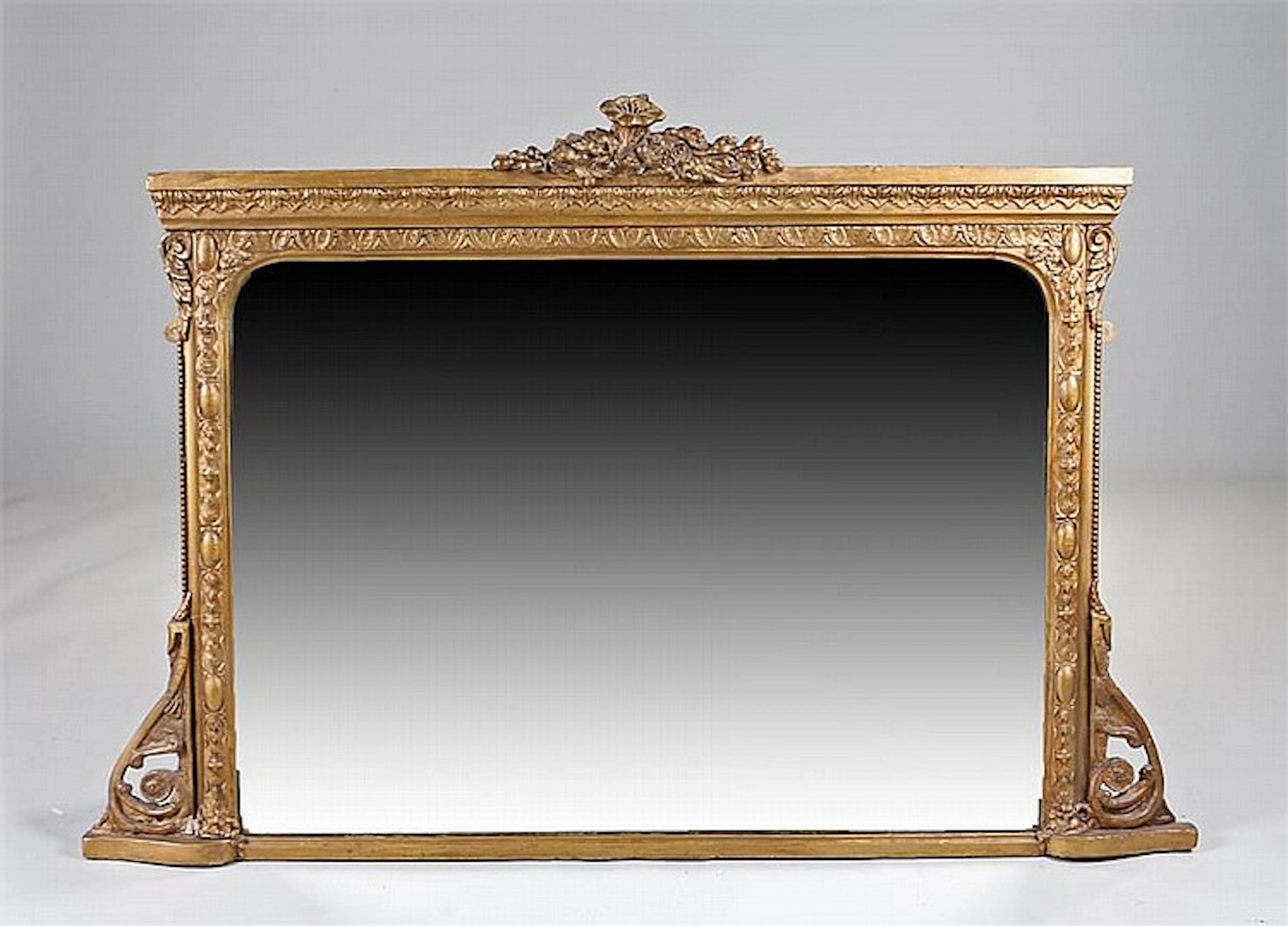 Regency overmantle mirror, the rectangular plate with a gilt gesso frame of