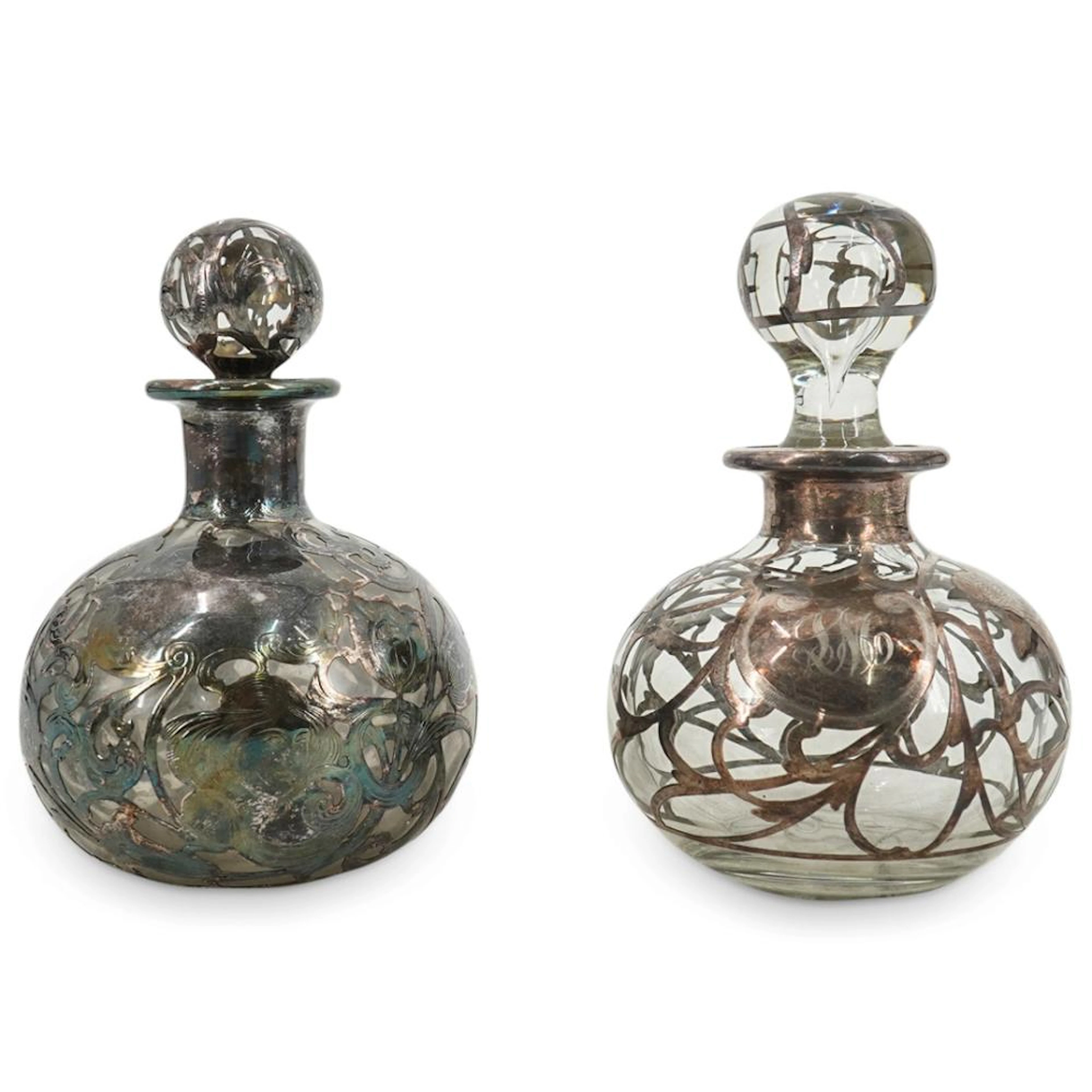 Pair of Antique Sterling Overlaid Glass Decanters