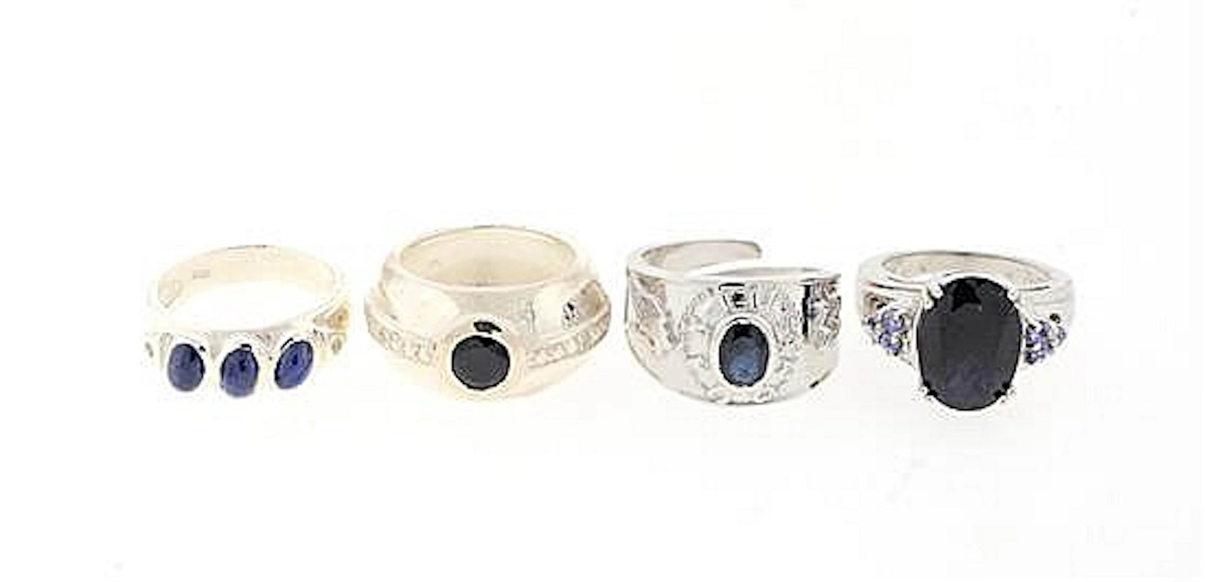 A GROUP OF STERLING SILVER AND SAPPHIRE RINGS
