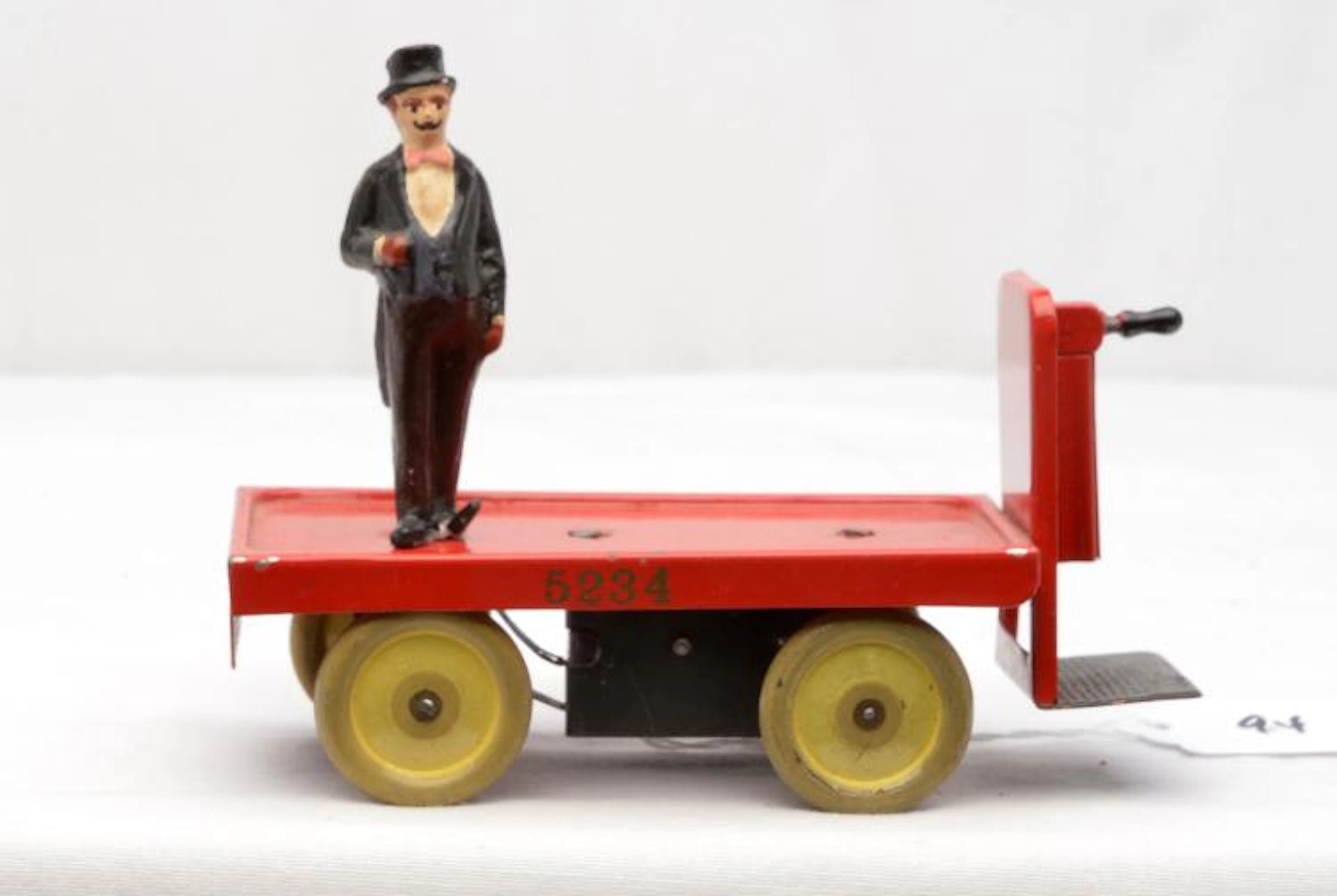 Marklin Prewar Red Clockwork Luggage Cart with Figure