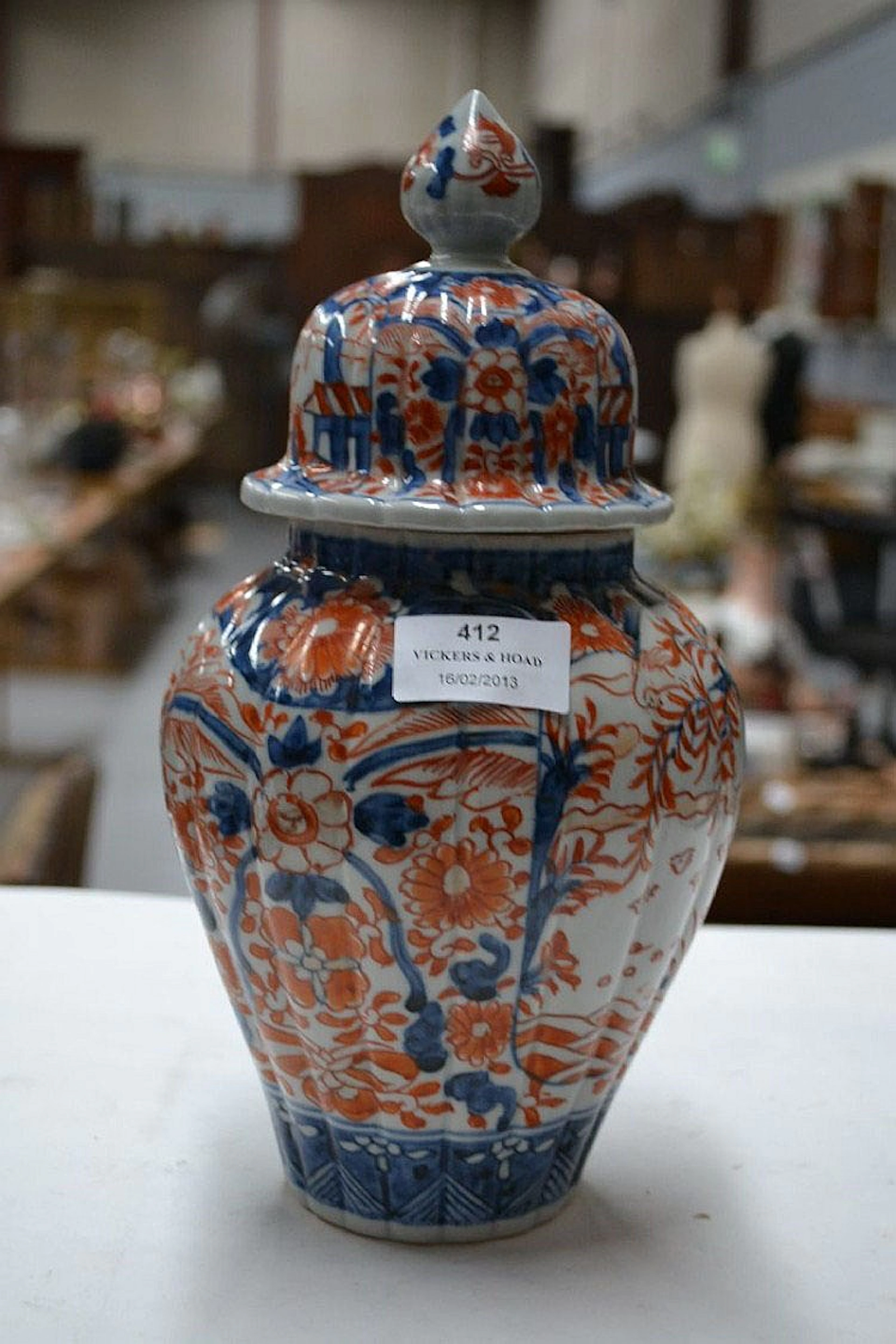Small Antique fluted design lidded Imari jar. 27cm