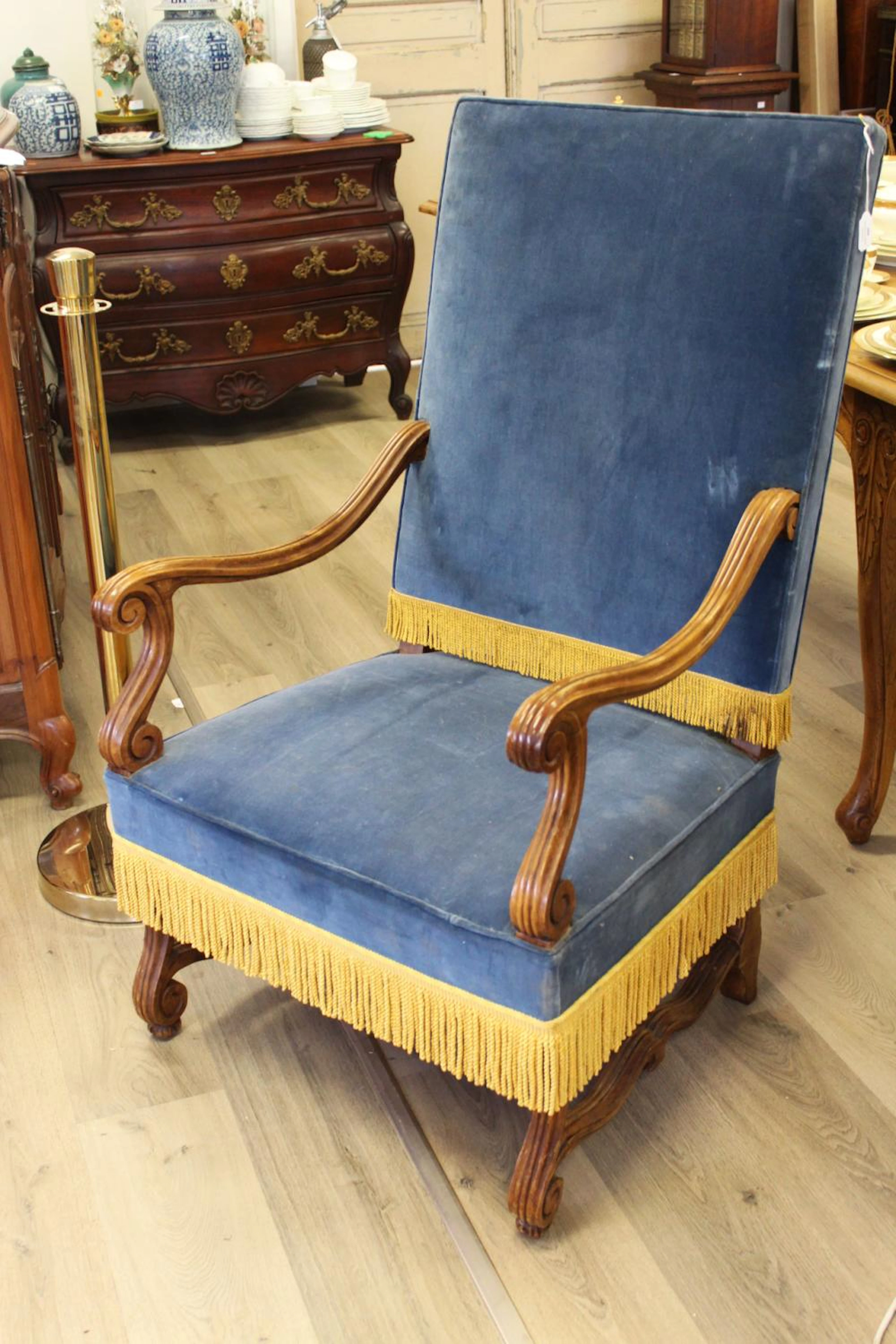 Antique French carved walnut high back arm chair