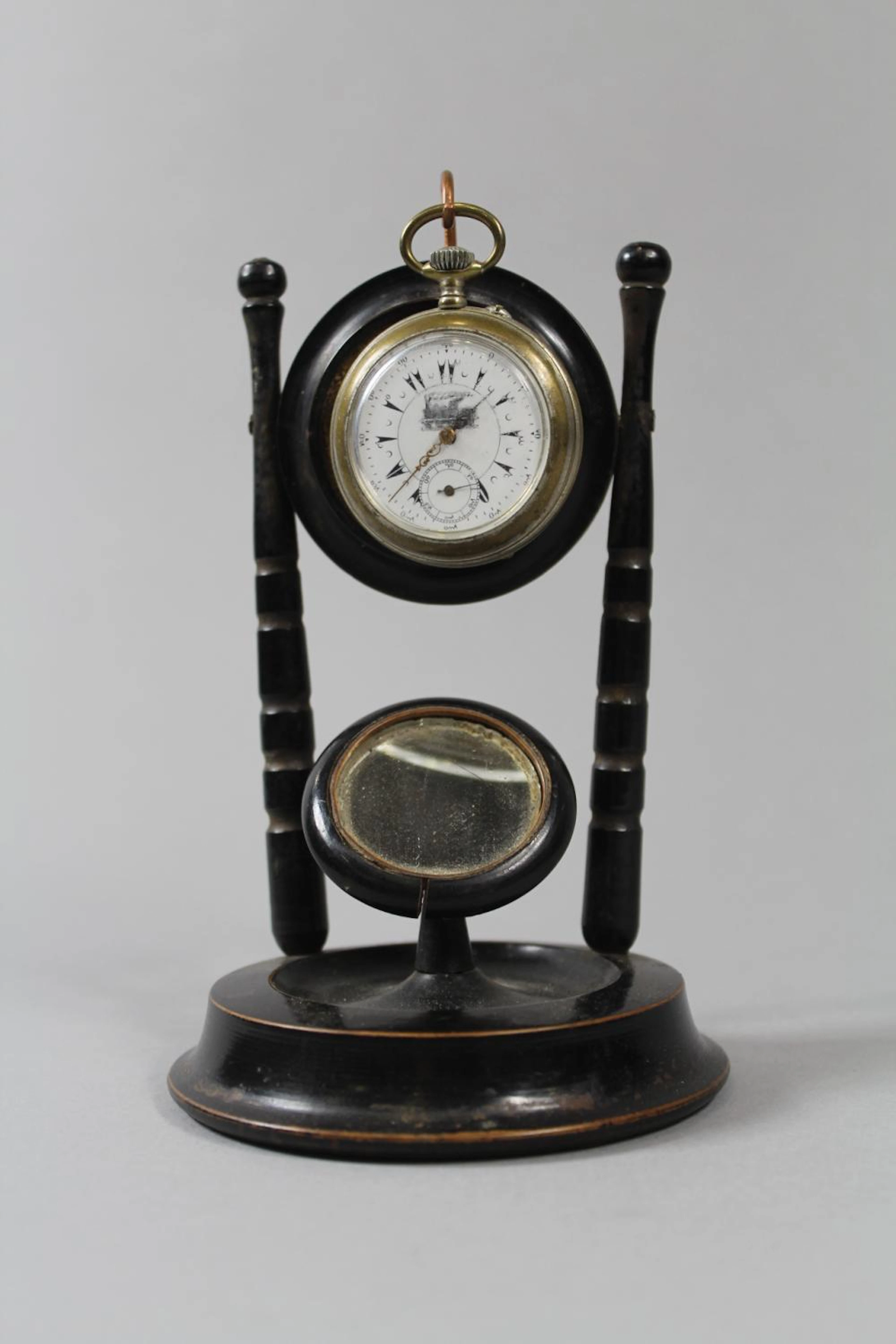 French Eclipse railway watch on wooden stand, approx 15cm H
