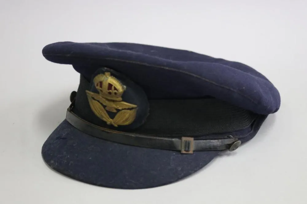 RAAF officer's cap complete with badge (King's crown) and chinstrap ...