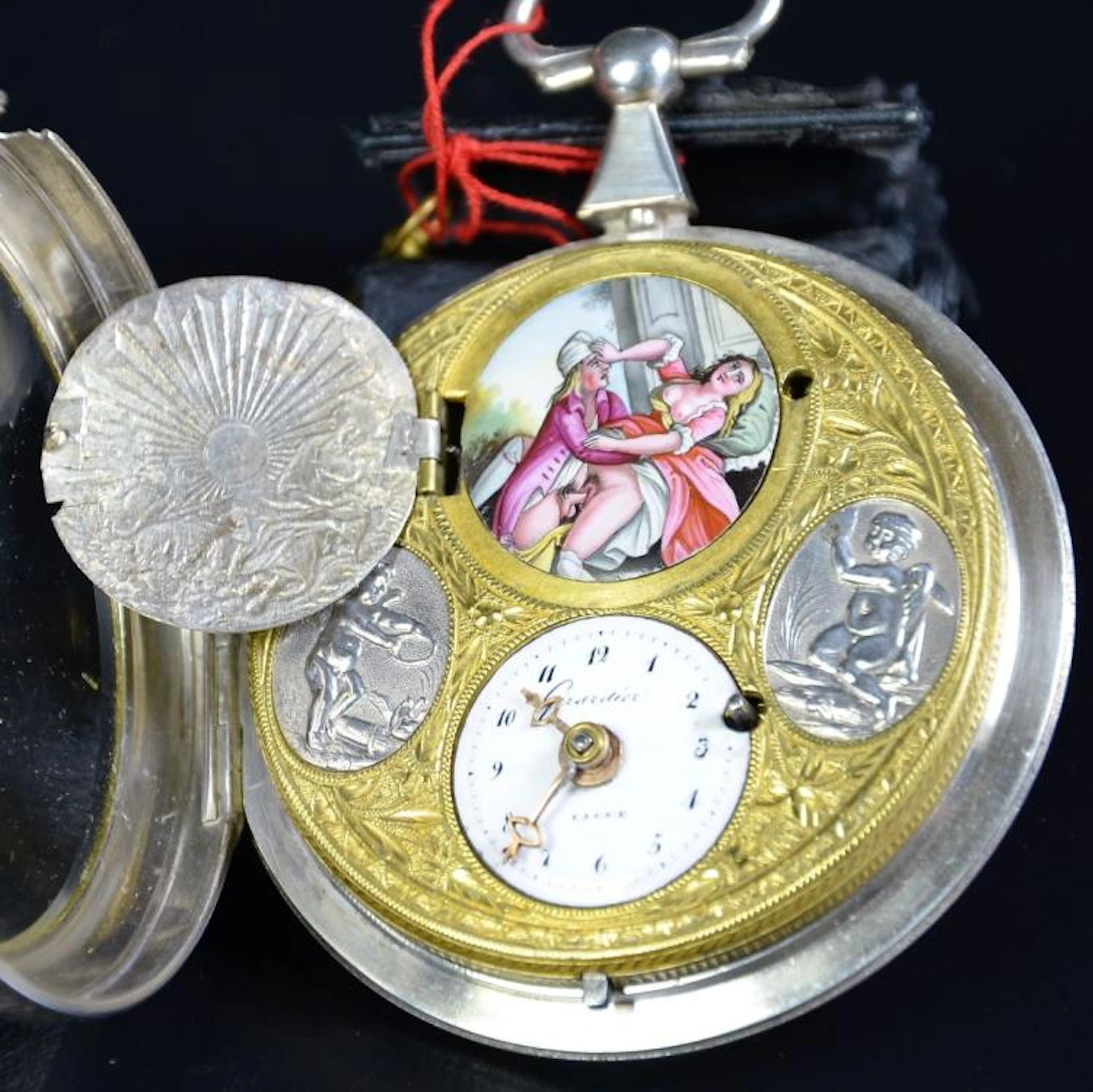 Silver erotic pocket watch with original key
