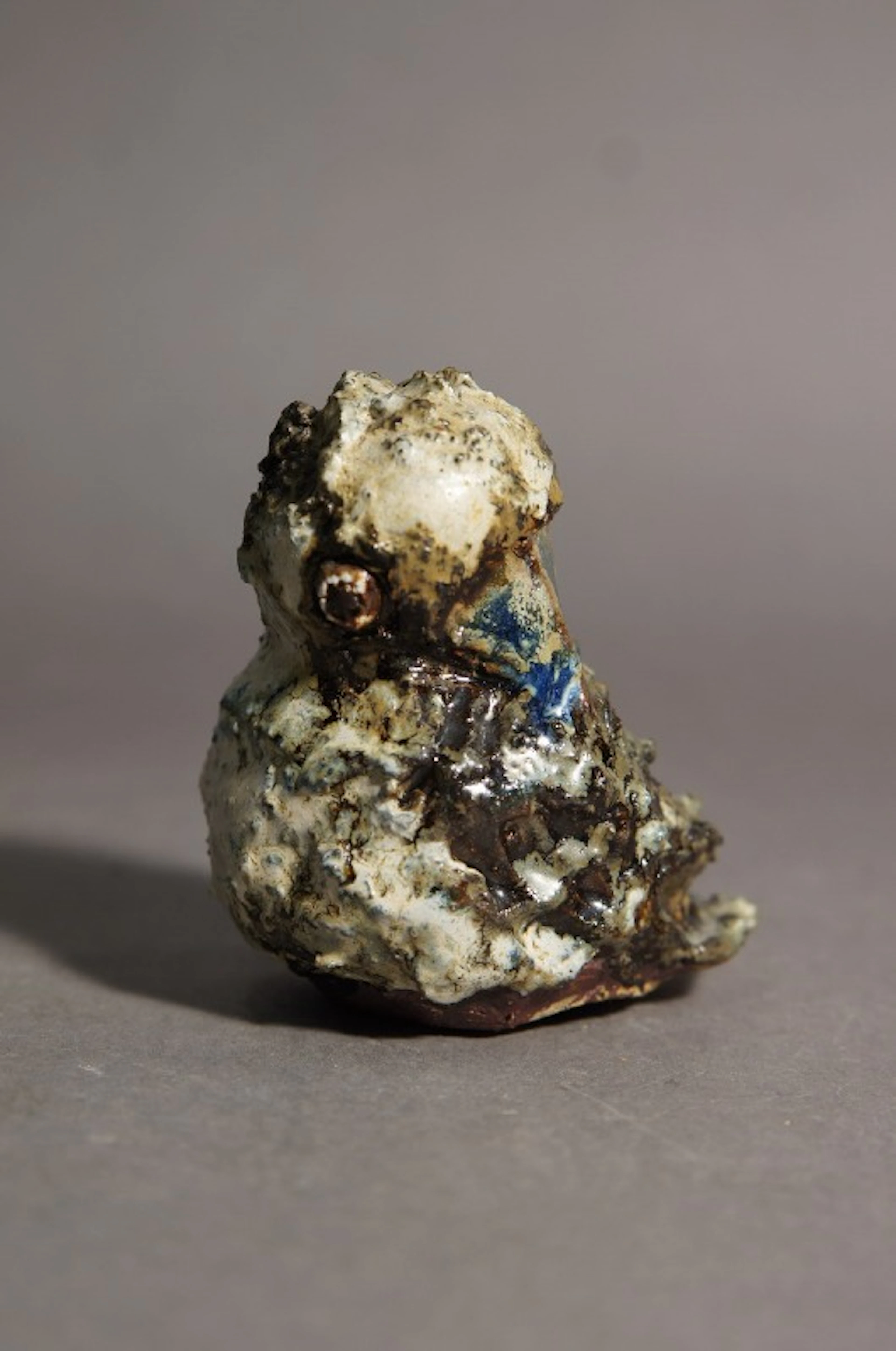 Figurin, troligen Tyra Lundgren, fågel