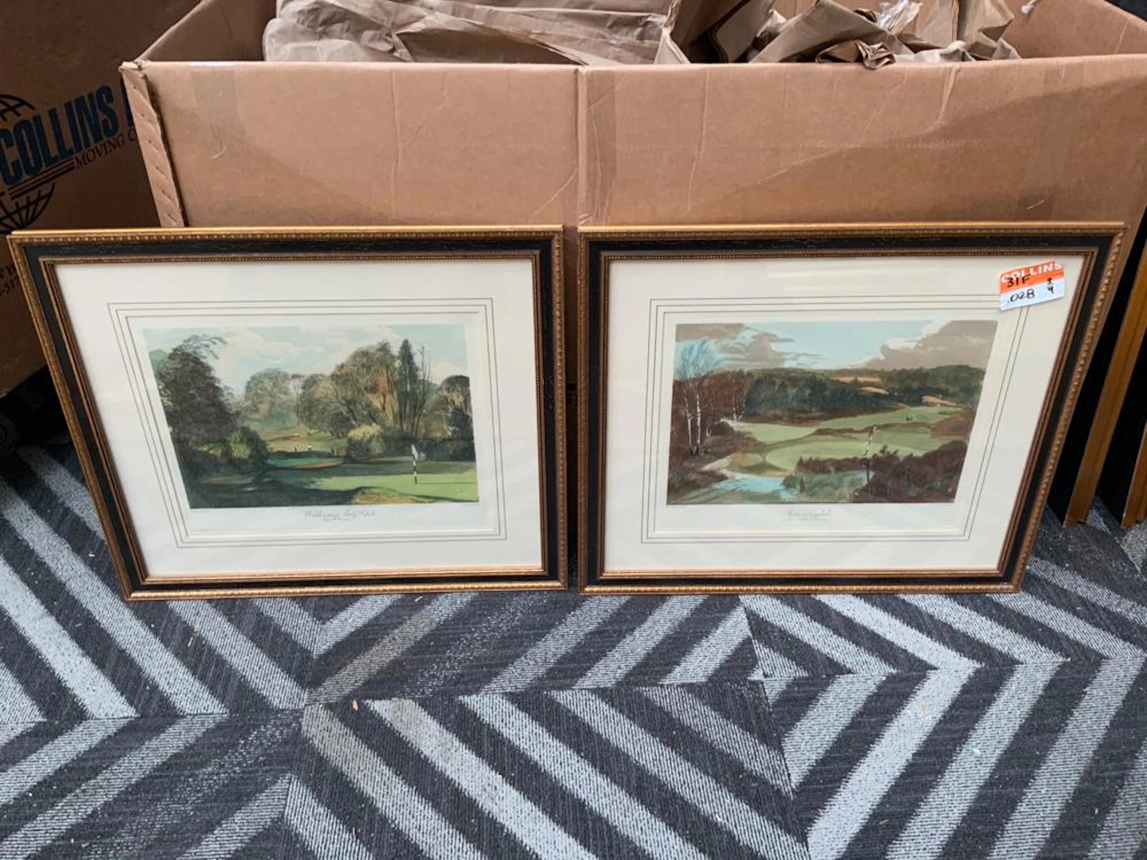 Pair of framed prints depicting golf courses