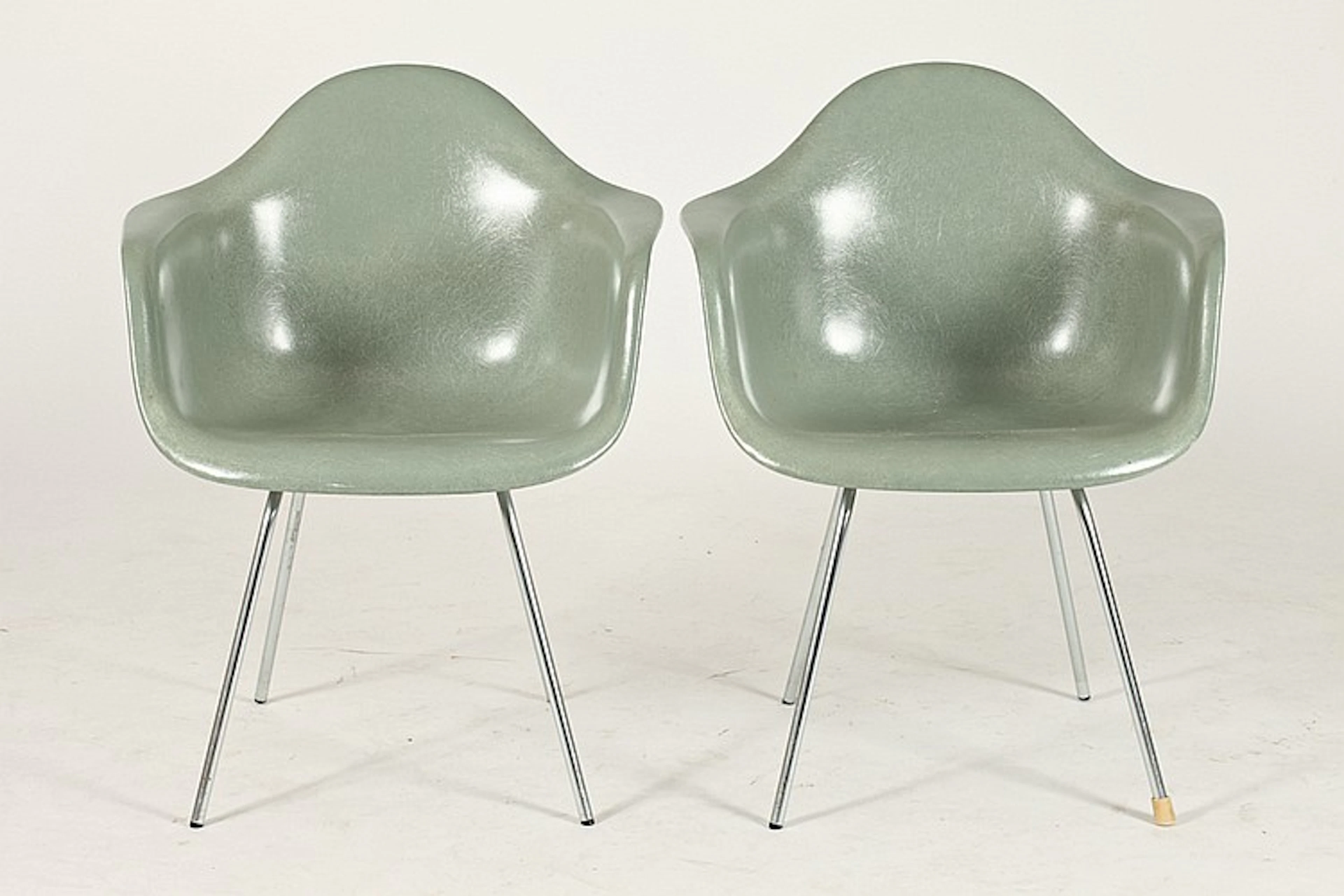 PAIR SIGNED AND DATED HERMAN MILLER CELADON GREEN COMPOSITION BUCKET CHAIRS