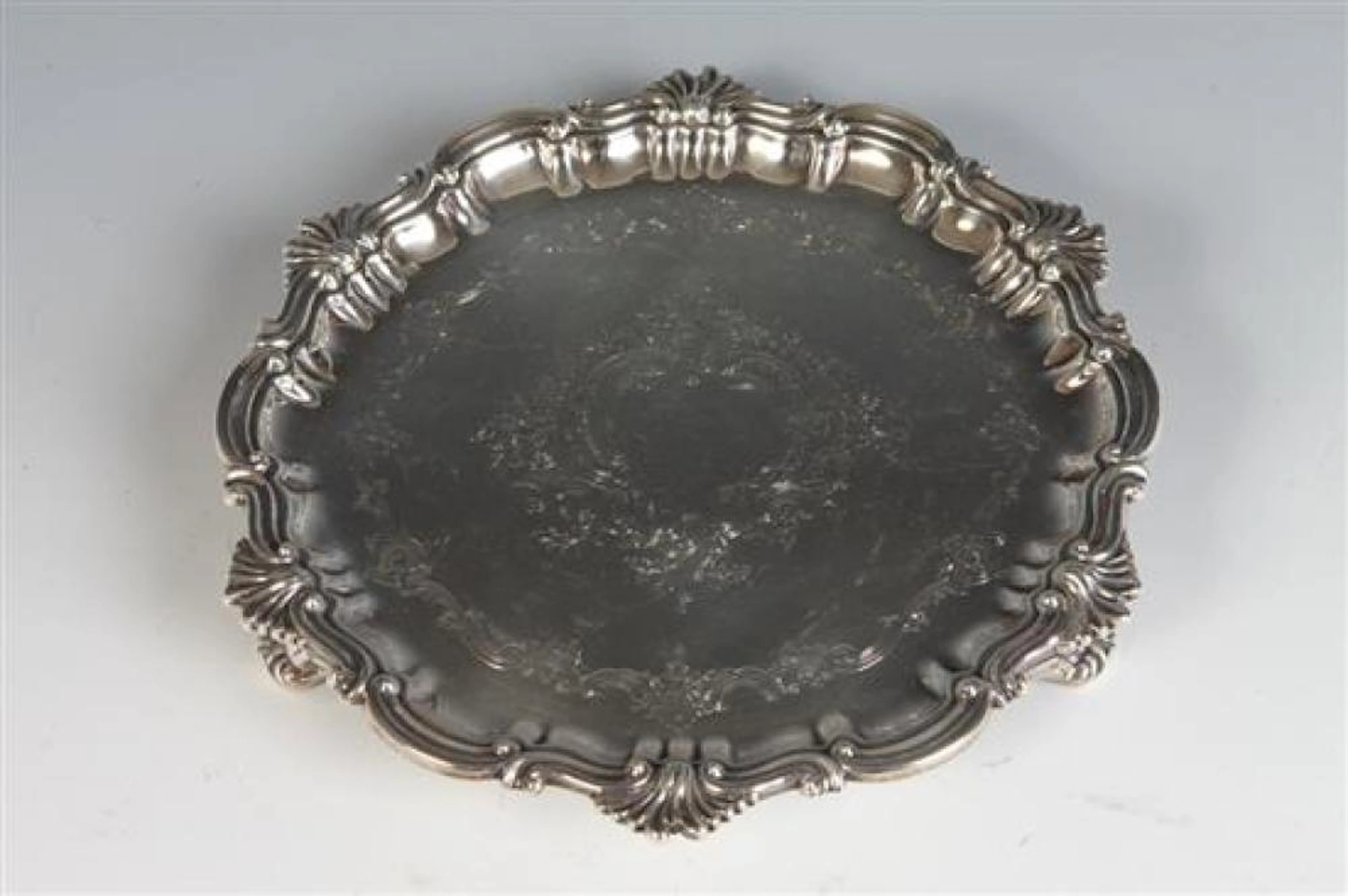 ENGLISH CHIPPENDALE-STYLE SILVER FOOTED SALVER OF SERPENTINE CIRCULAR OUTLINE