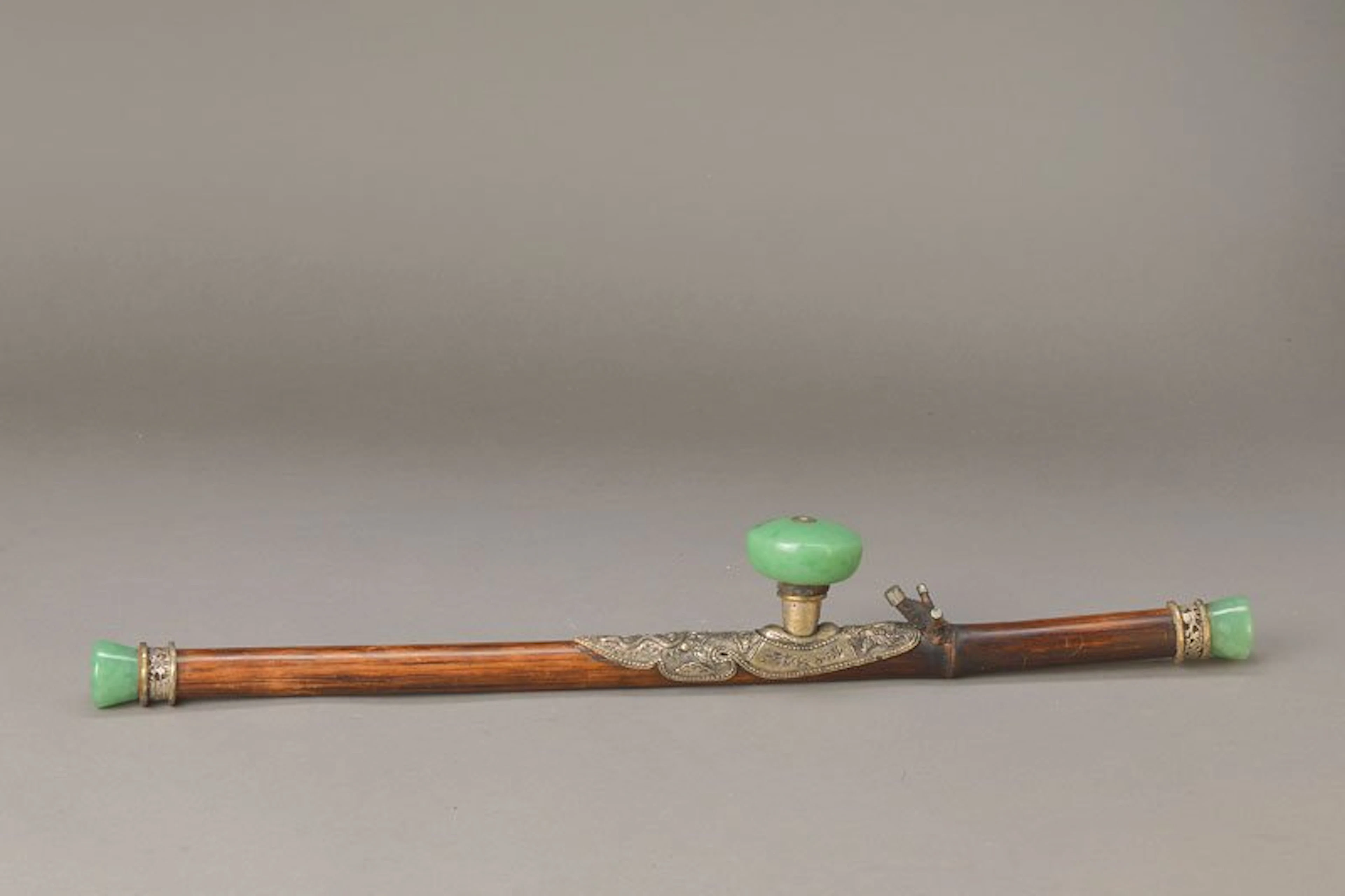 Opium pipe and green jade casing